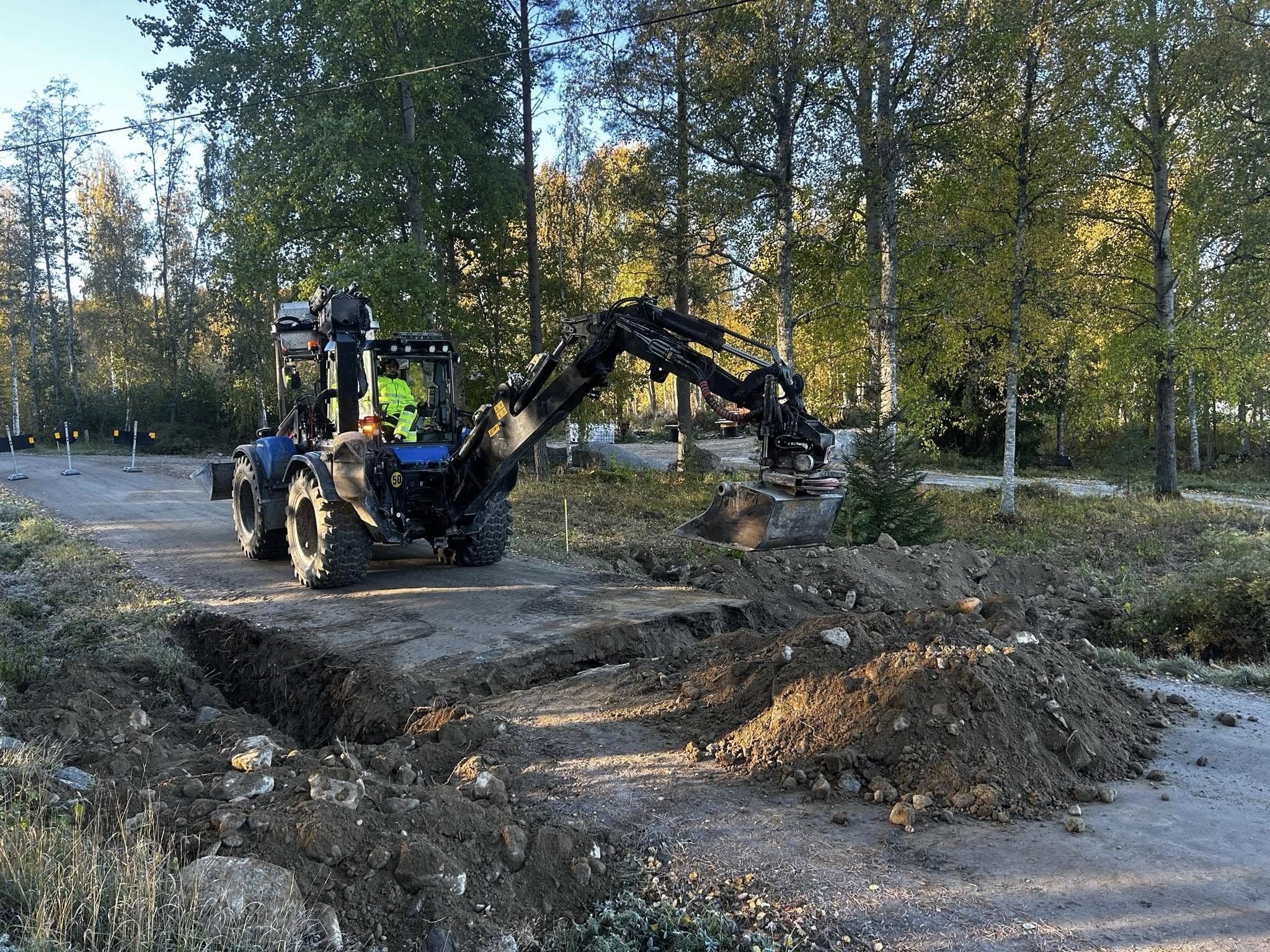 Huddig traktorgrävare