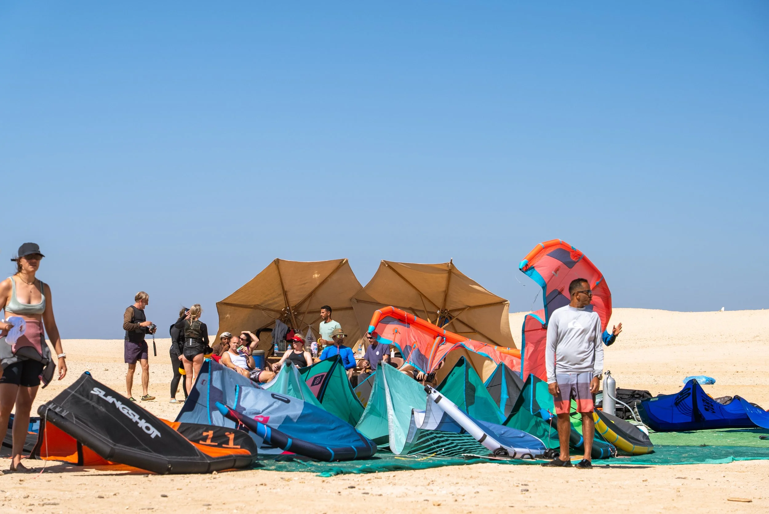 Beach Set-up on the spot, kites laying on the ground