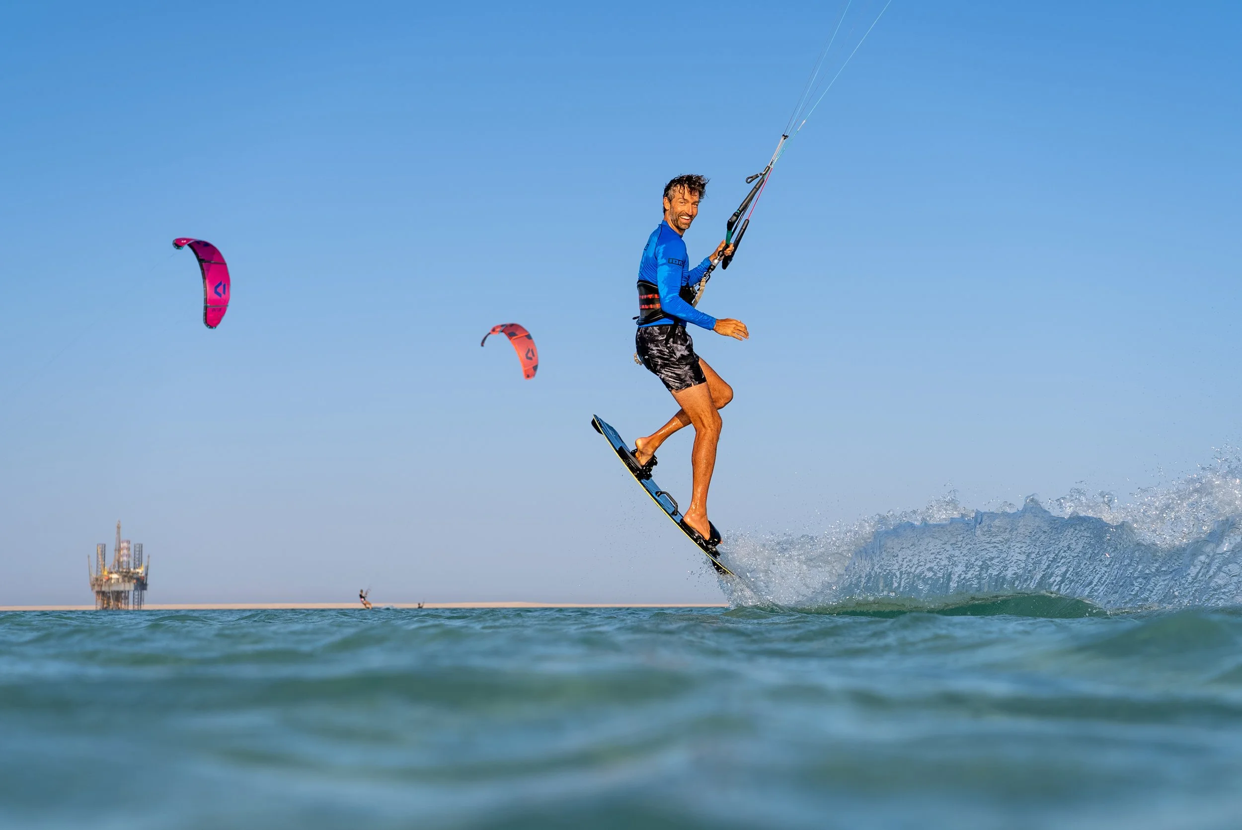 Kitesurfer jumping on the kite safari in the Red Sea