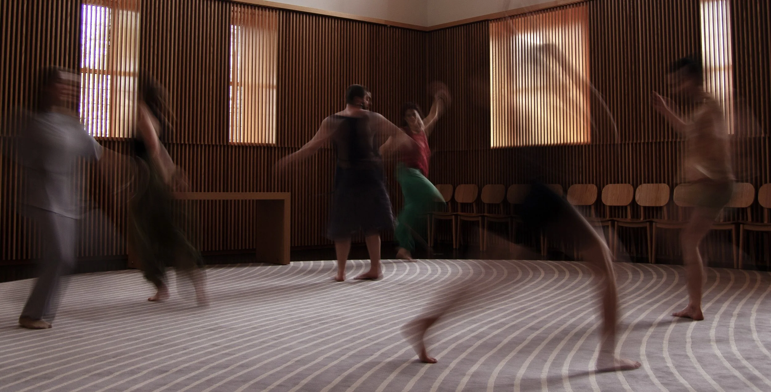 Five Blurry Dancers in a Room