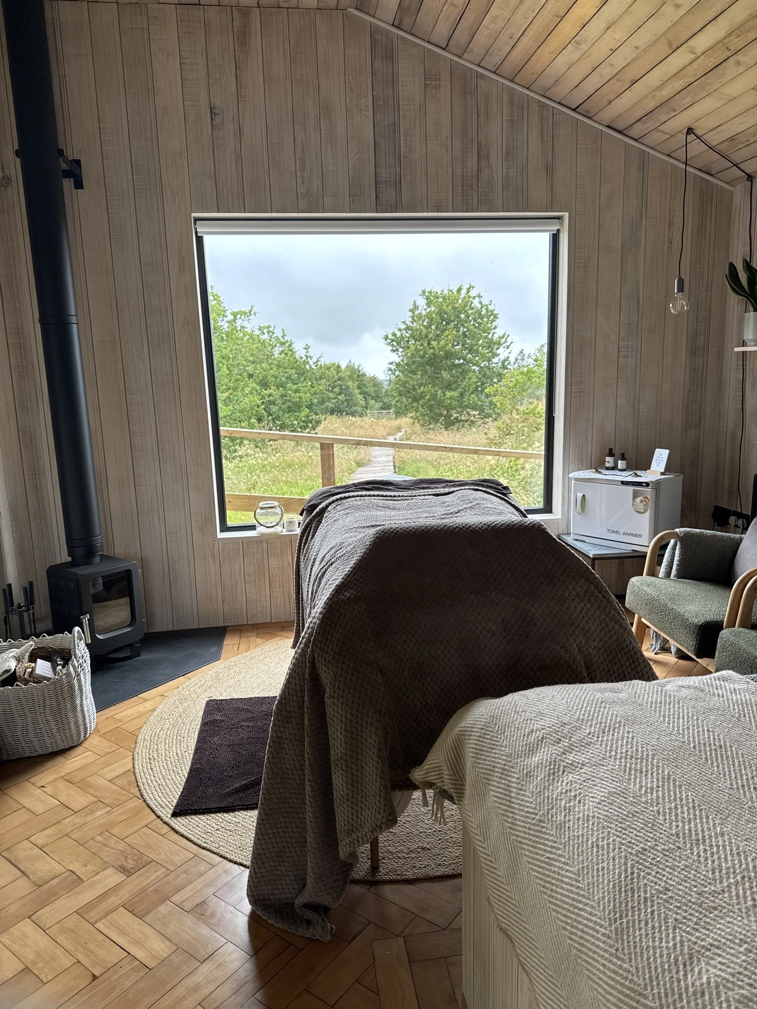 Images of massage bed set up in Hideaway cabin