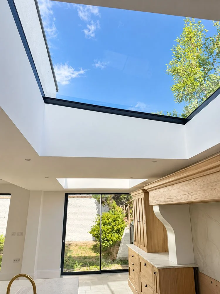 Large rooflight bringing natural light into the finished kitchen extension at West Drive, Brighton