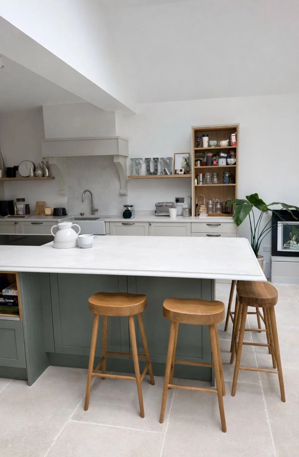 Modern kitchen with island and breakfast stools in the completed Shirley Drive extension