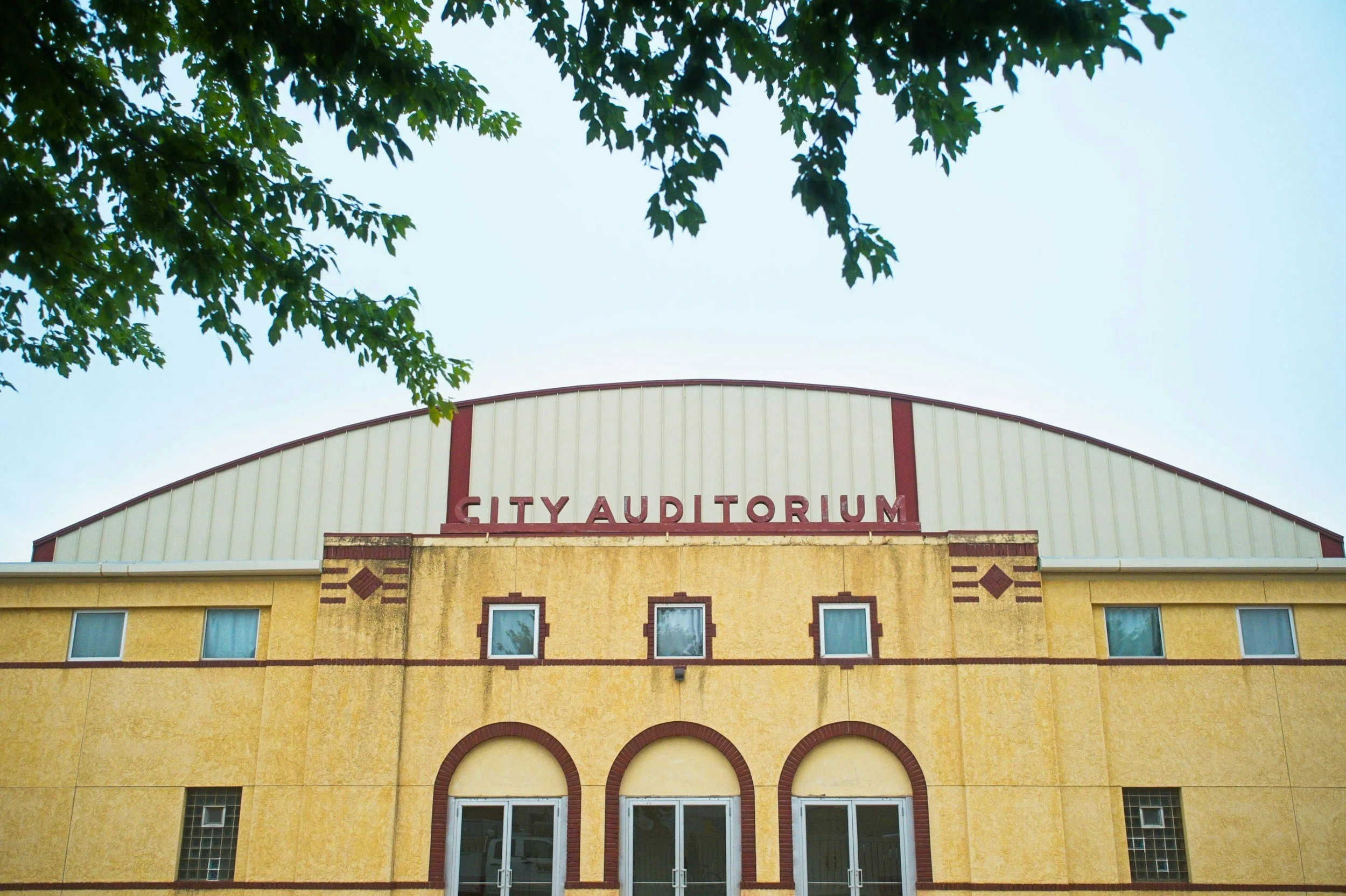 city auditorium from outside on a sunny warm day