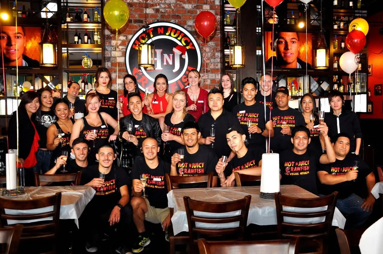 Group photo of Hot n Juicy employees.