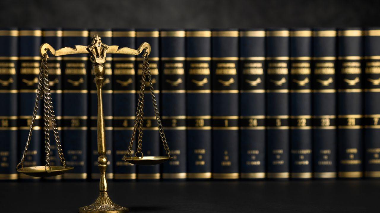 Scales of justice symbolizing legal rights when debt collectors threaten legal action