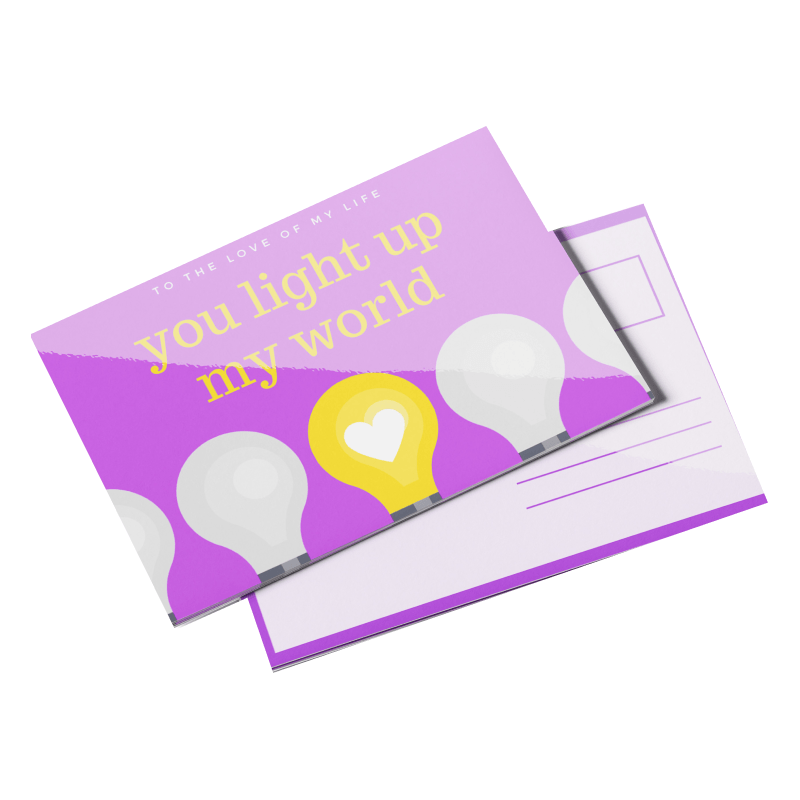 Open greeting card with purple background, yellow text reading 'you light up my world', and illustrations of light bulbs, one with a heart in the center.