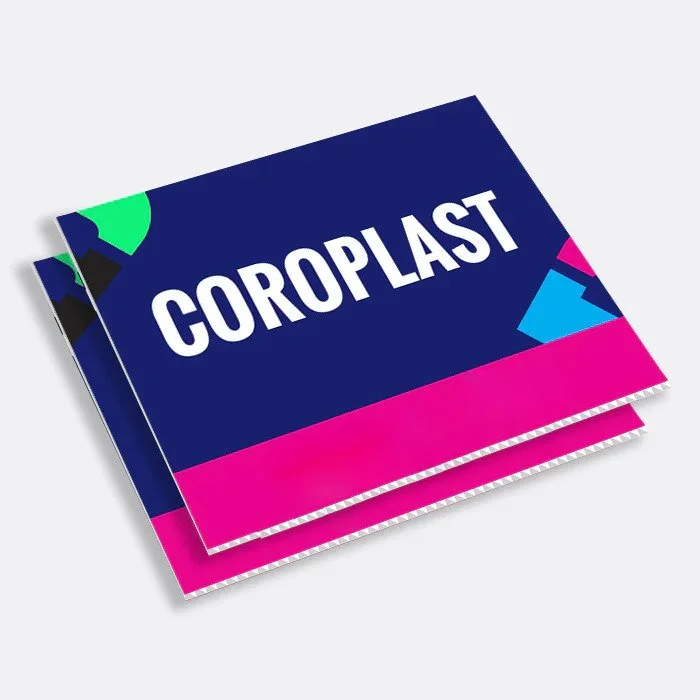 Stacks of colorful cards with the word 'CORoplast' printed on the top card.