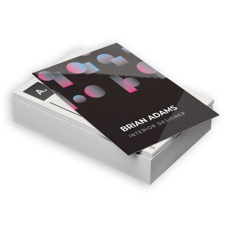 Business cards featuring modern, abstract design with pastel-colored circles and text for interior designer Brian Adams.