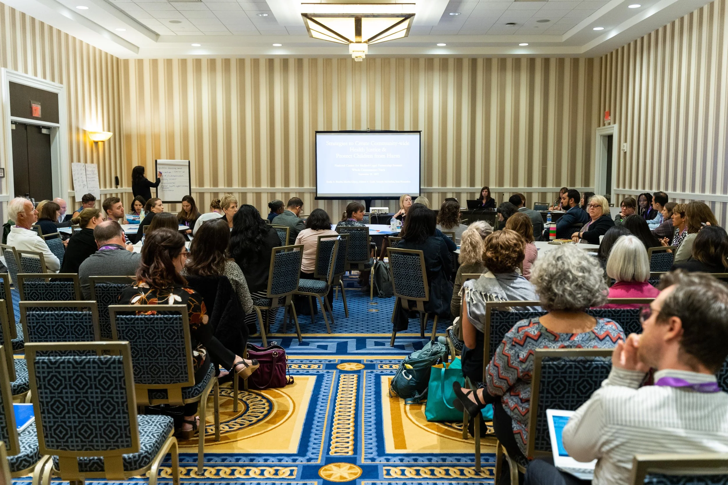  Attendees listen in on a workshop session at the 2019 MLP Summit 