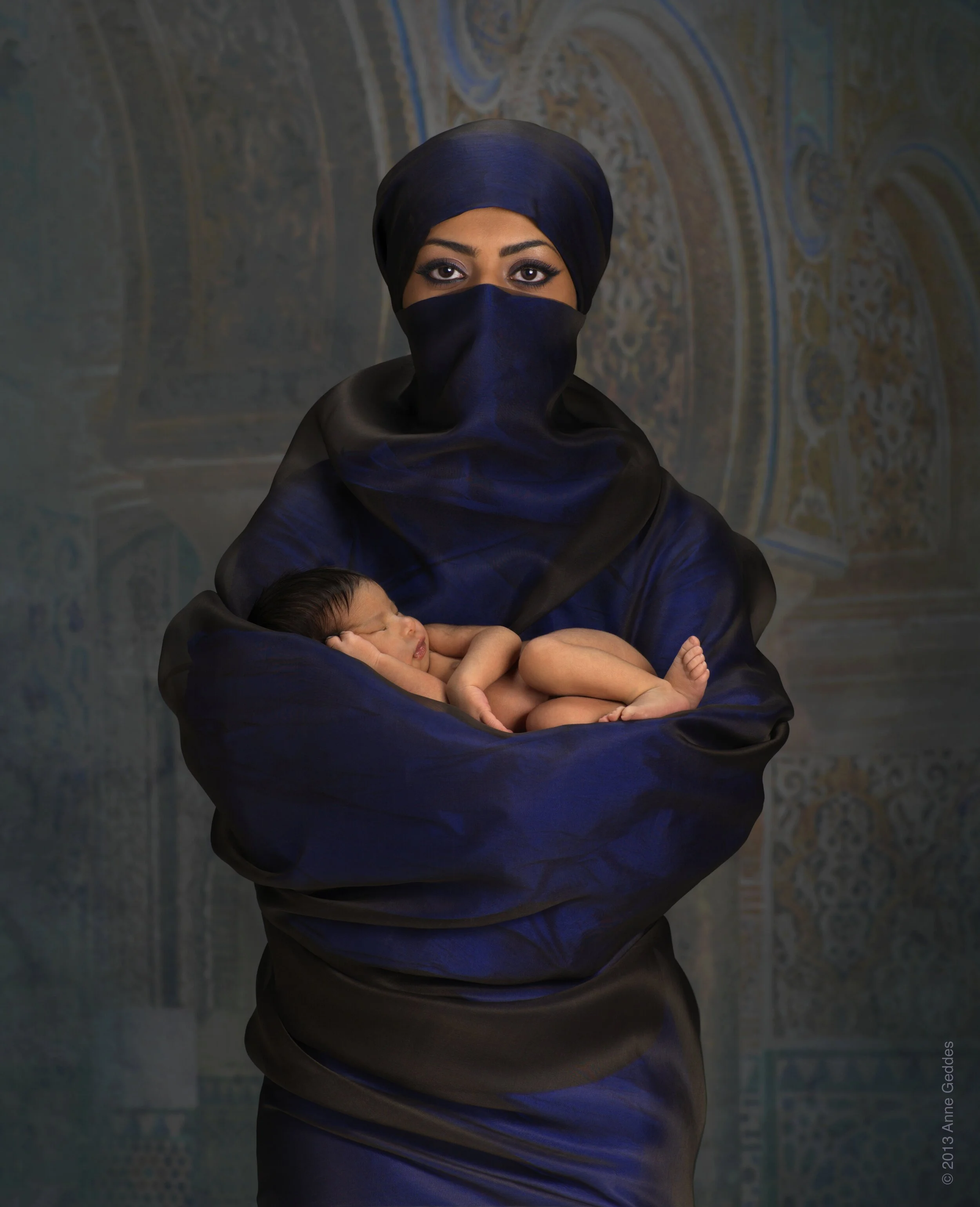 Sheikha+Reem+Mohamed+Al+Thani+(Equestrian)+holding+Noura+(7+days+old)(1).jpg