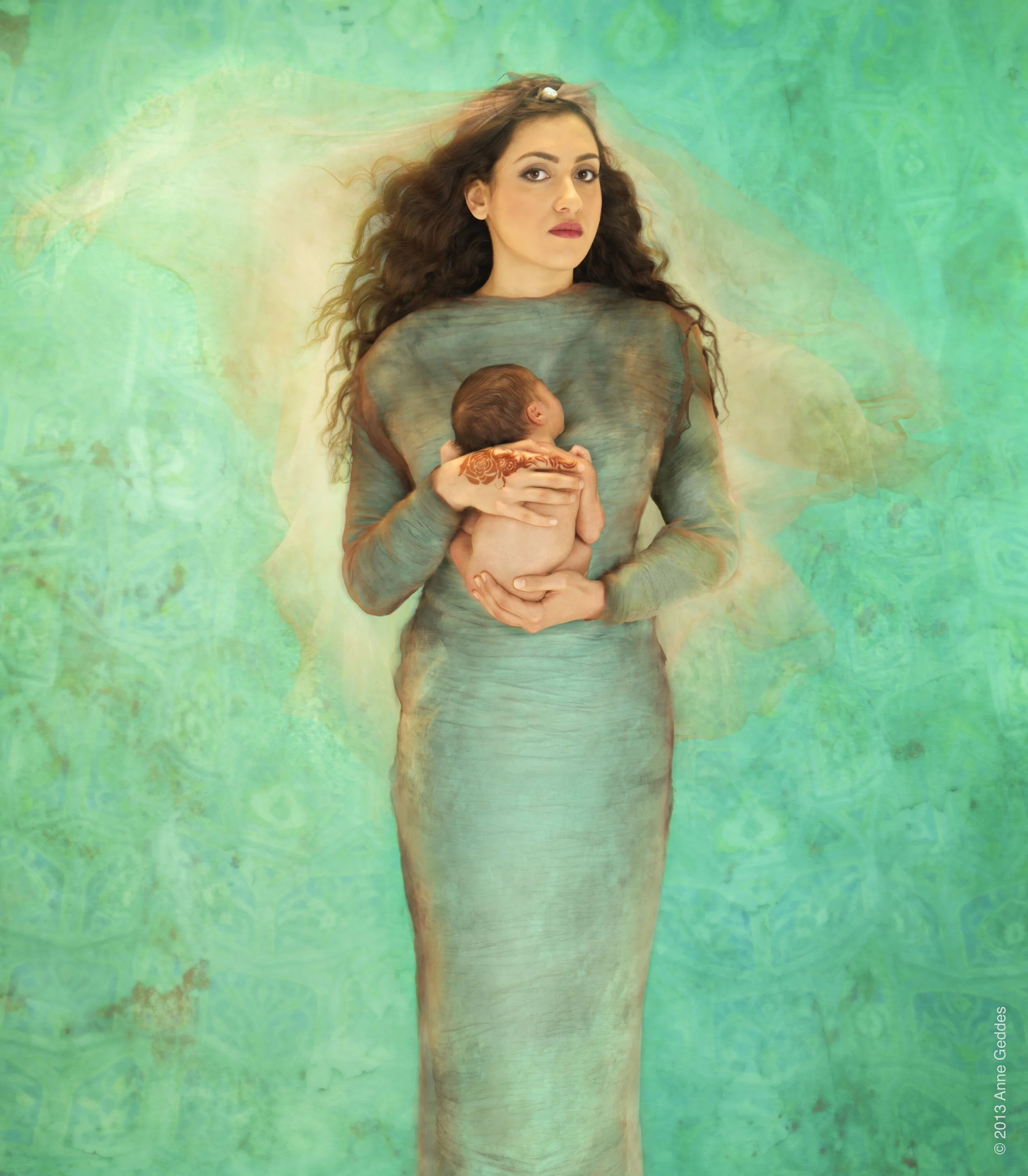 Nada+Mohammed+Wafa+(Swimmer)+with+Abdullah+(7+days+old)(1).jpg