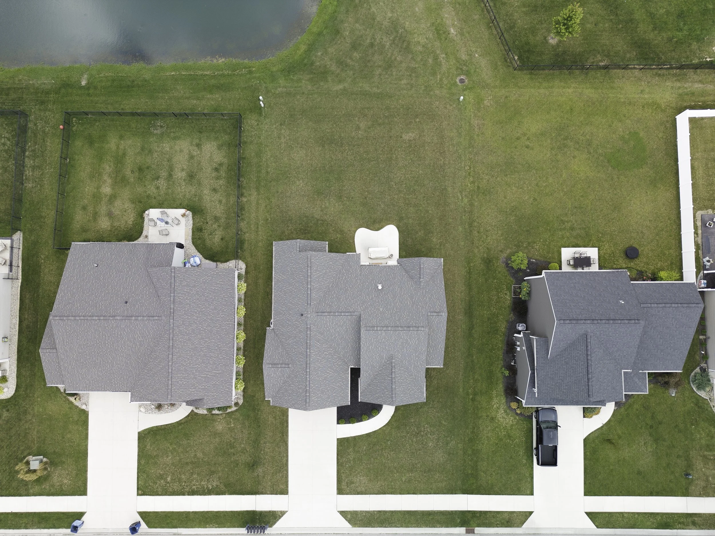 Aerial drone photograph of homes from a birds Eye view
