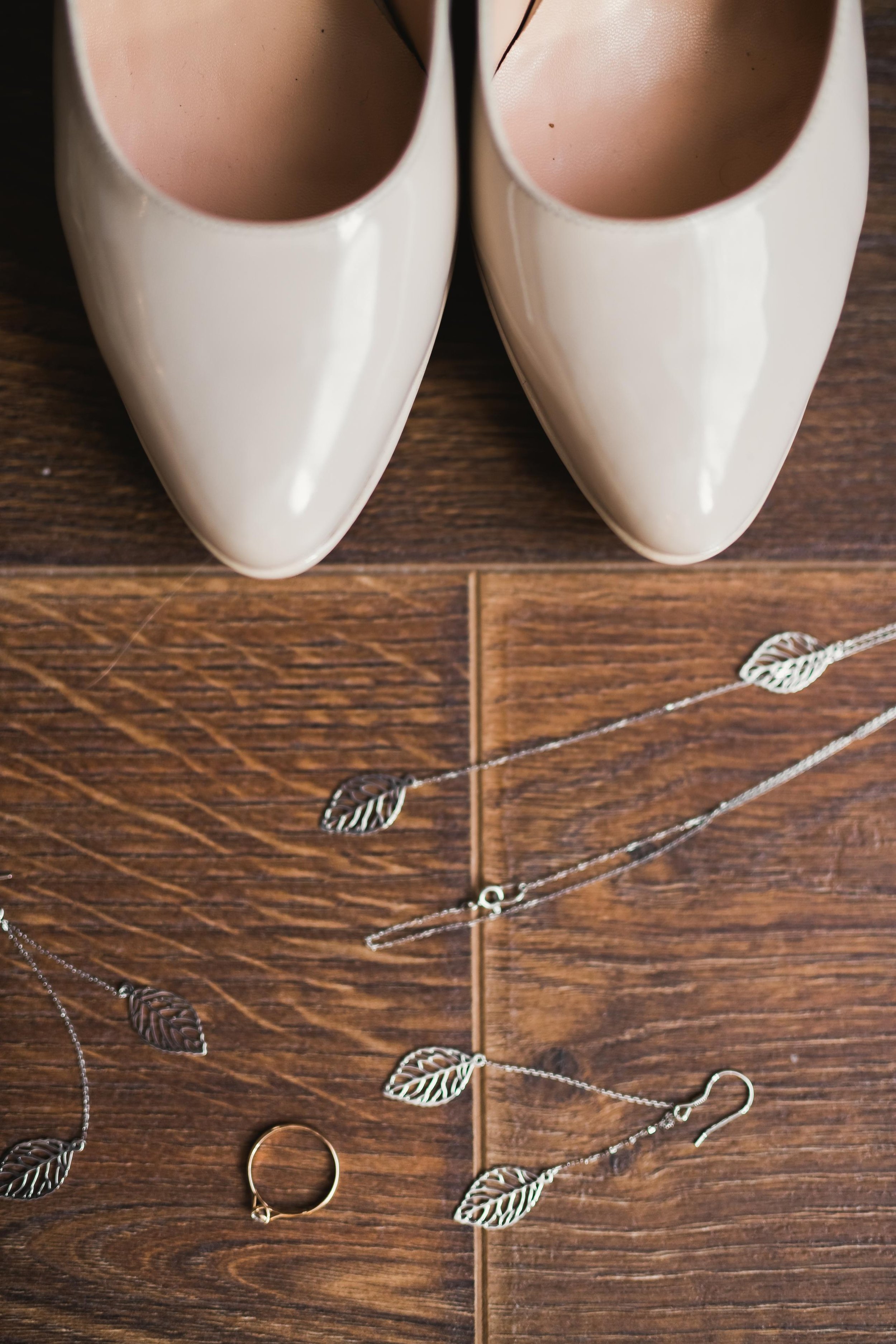 124031429-brides-wedding-shoes-and-costu.jpeg