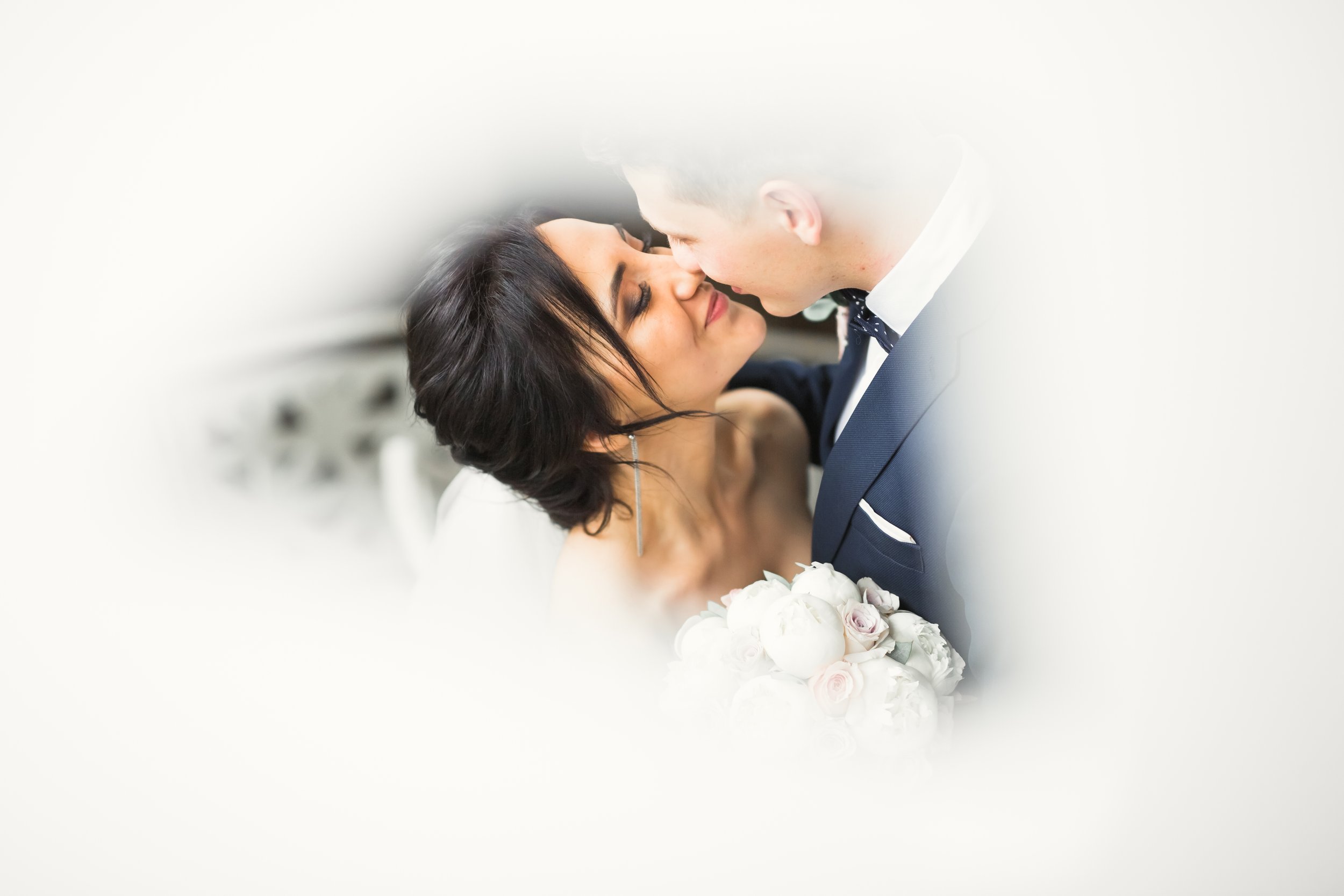 236427680-beautiful-bride-and-groom-embr.jpeg