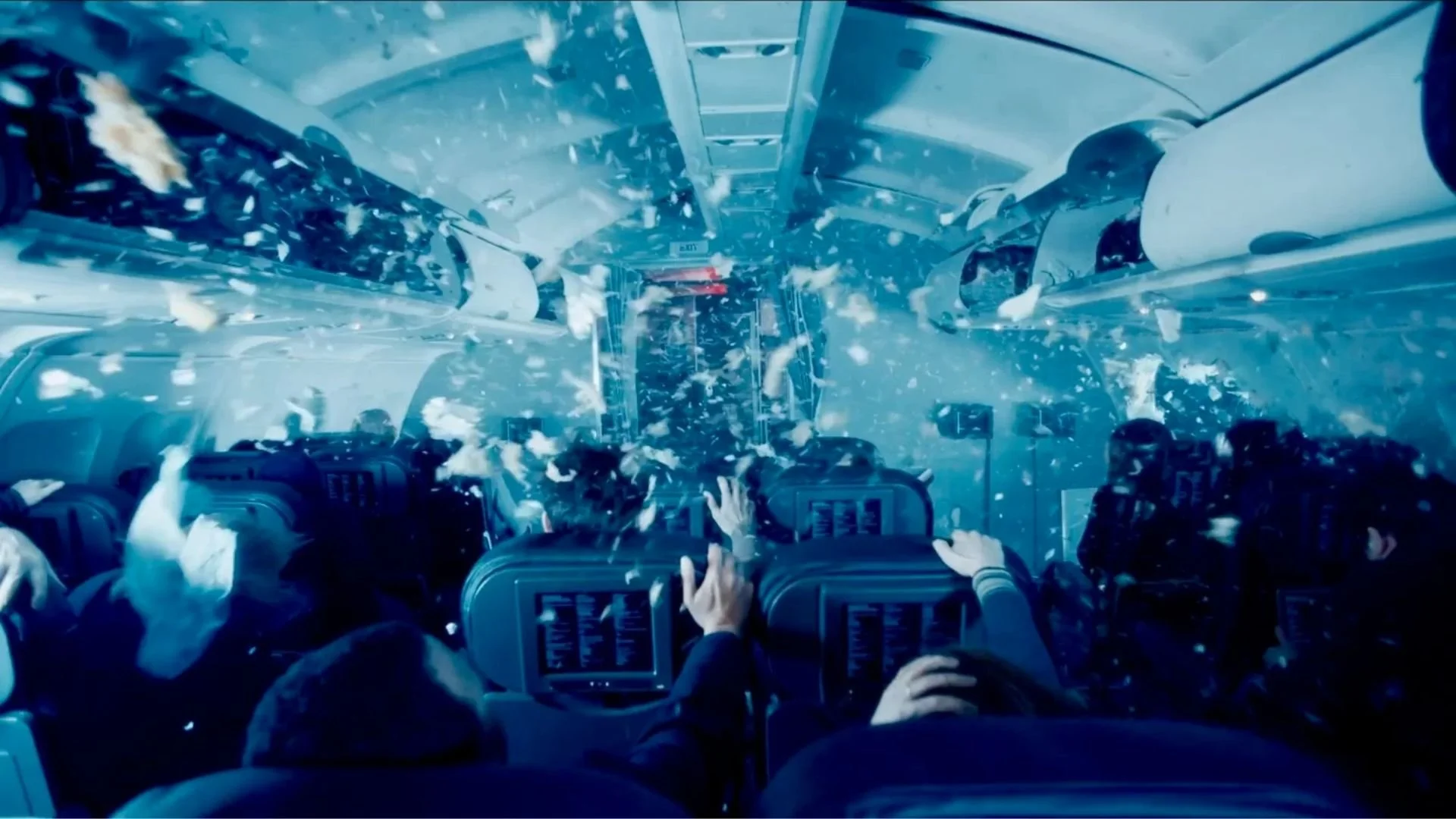 Interior view of a bus colliding with a large iceberg, with passengers raising their hands and debris flying through the air.