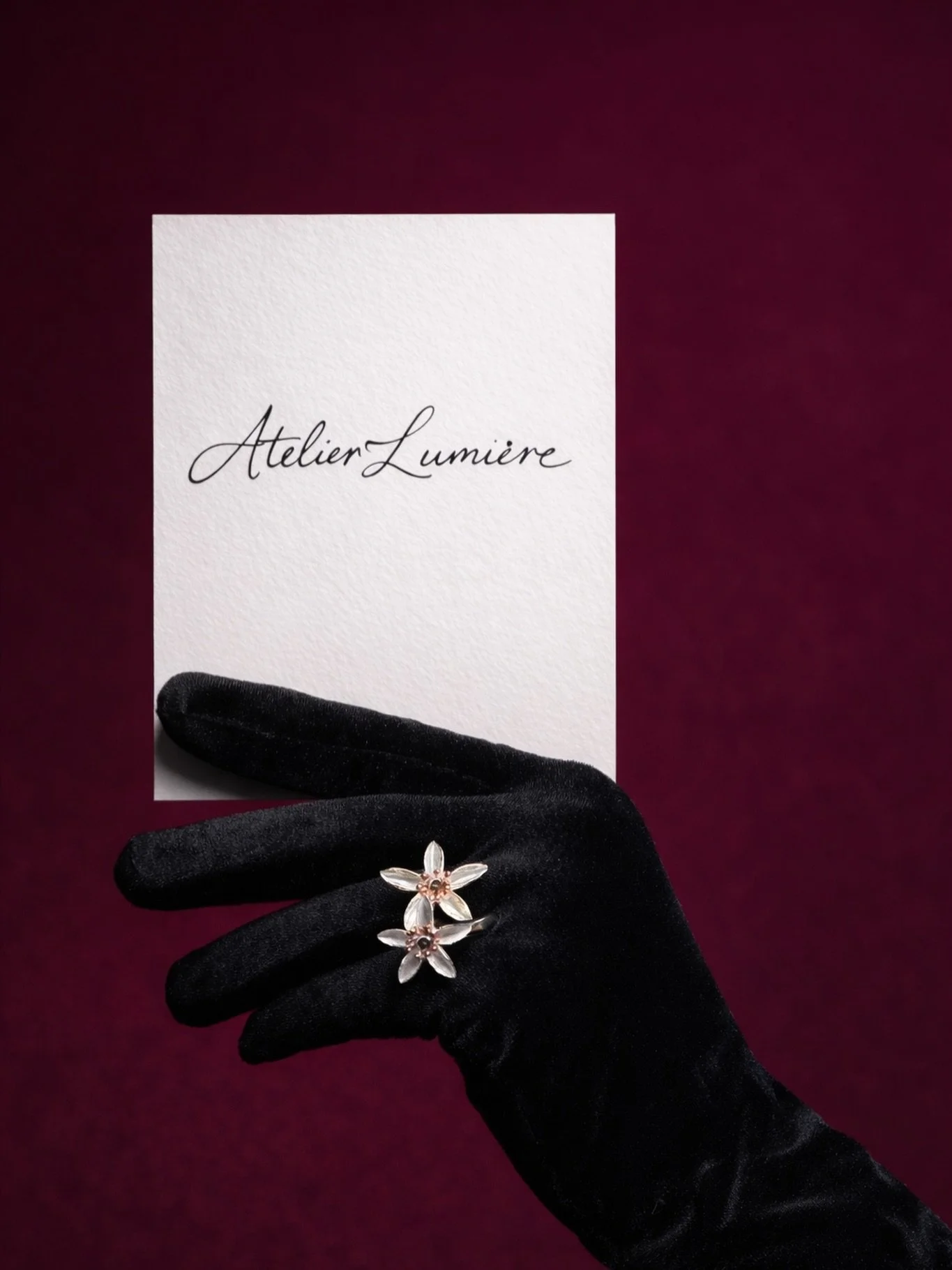 The Orange Blossom Ring 
&bull; Hand-sculpted in silver, each flower uniquely formed. Fully hand-crafted, requiring over twelve hours of meticulous work, finished with a warm rose-gold center