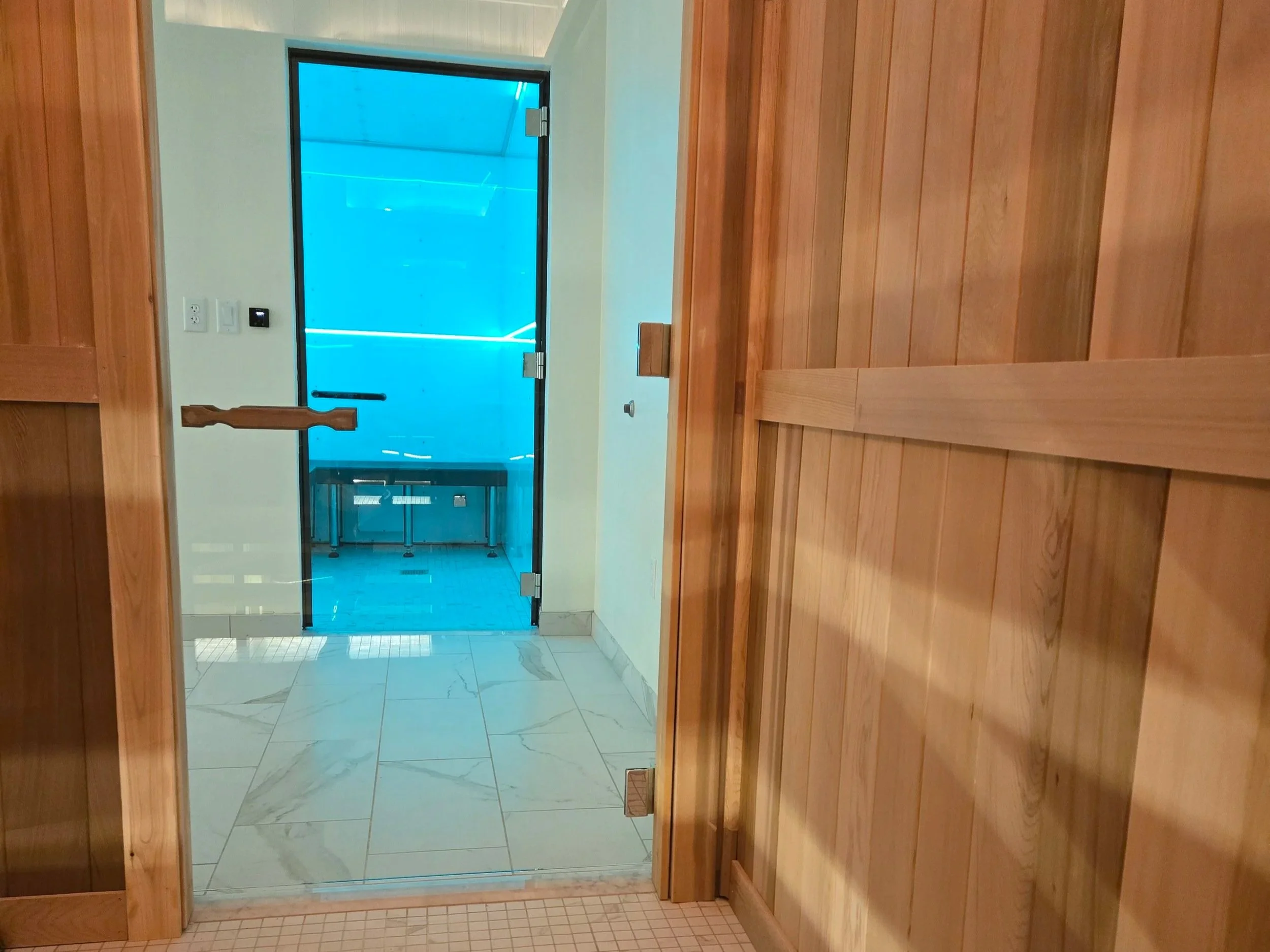 view into the steam room from inside the sauna