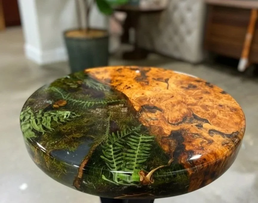 Resin furniture with live edge wood and moss art and real ferns