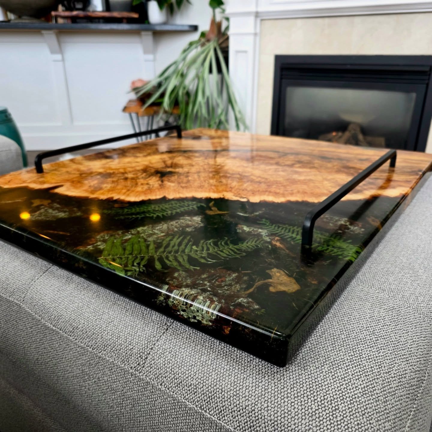Custom forestscapes ottoman tray made for some wonderful  clients.

Made from locally sourced live edge spalted maple burl, epoxy resin, and items foraged from Pacific Spirit Park. My clients also stopped by the shop to add some chanterelle mushrooms