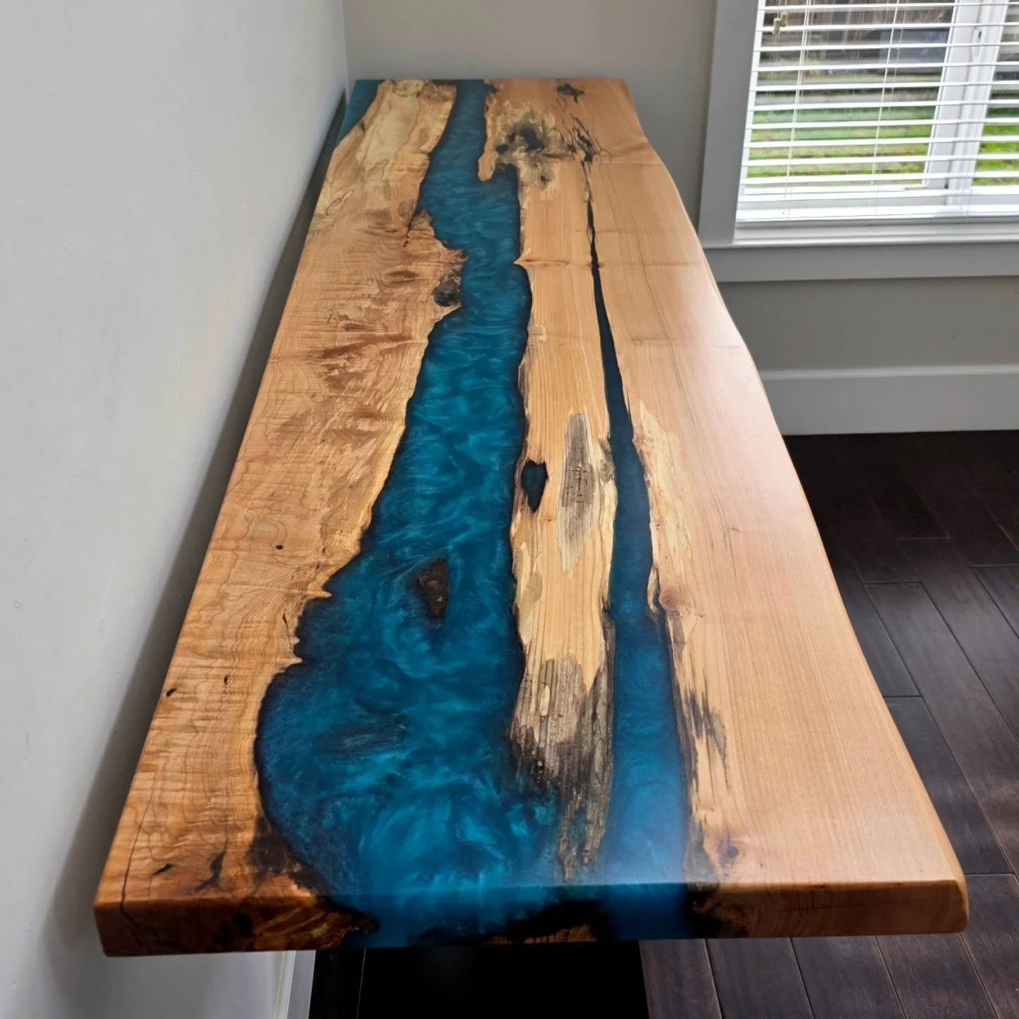 84" x 24" console table with figured maple, bright blue epoxy, and a front facing live edge. Delivered and installed for a local client in White Rock last week 💙.

What's stopping you from starting your next dream project?

Get started by 