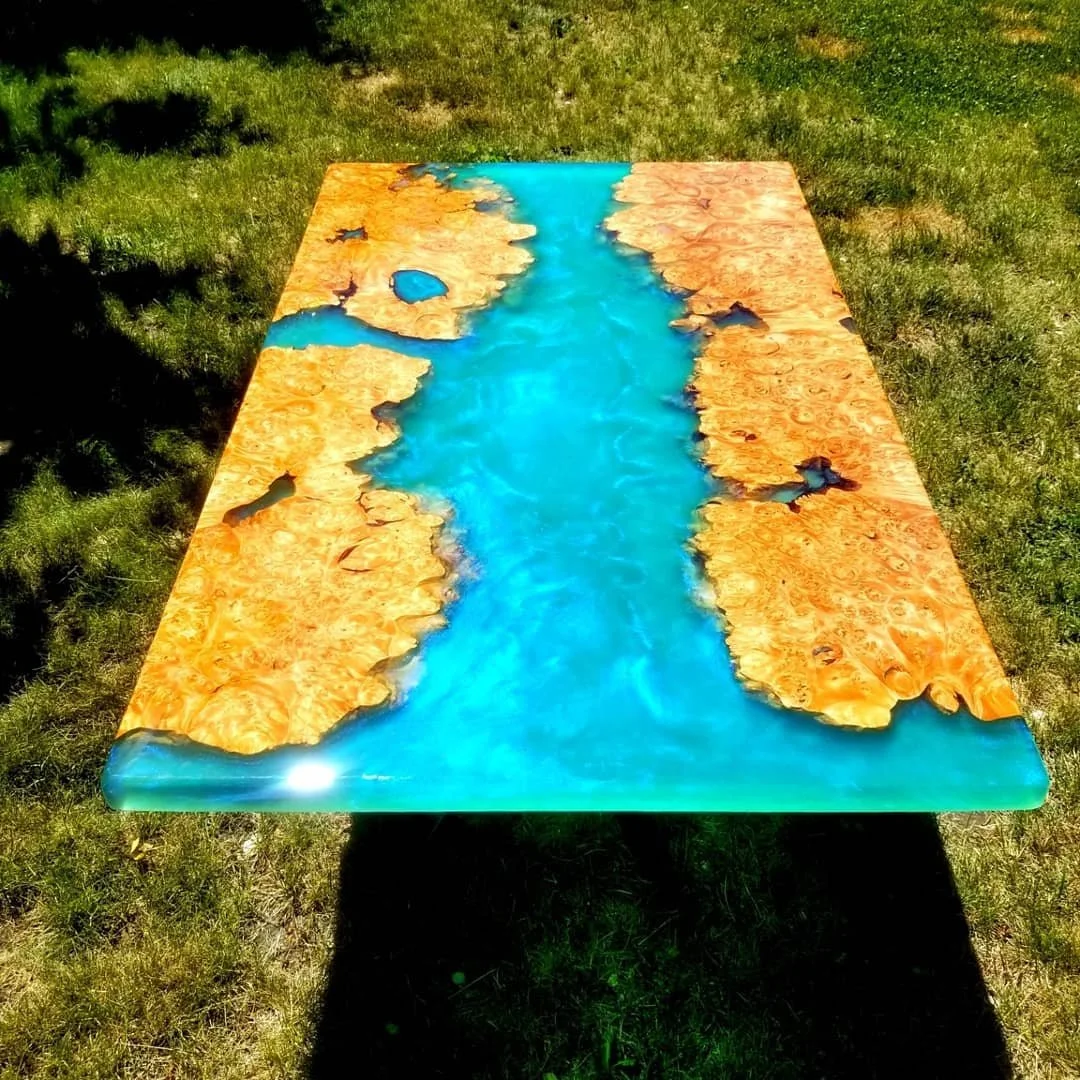 resin furniture by haig designs made with maple burl live edge wood and blue epoxy