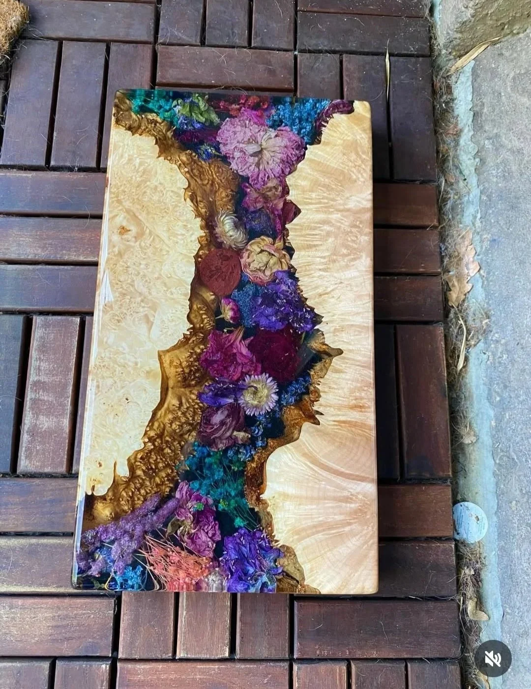 resin charcuterie board with preserved flowers and maple burl live edge wood