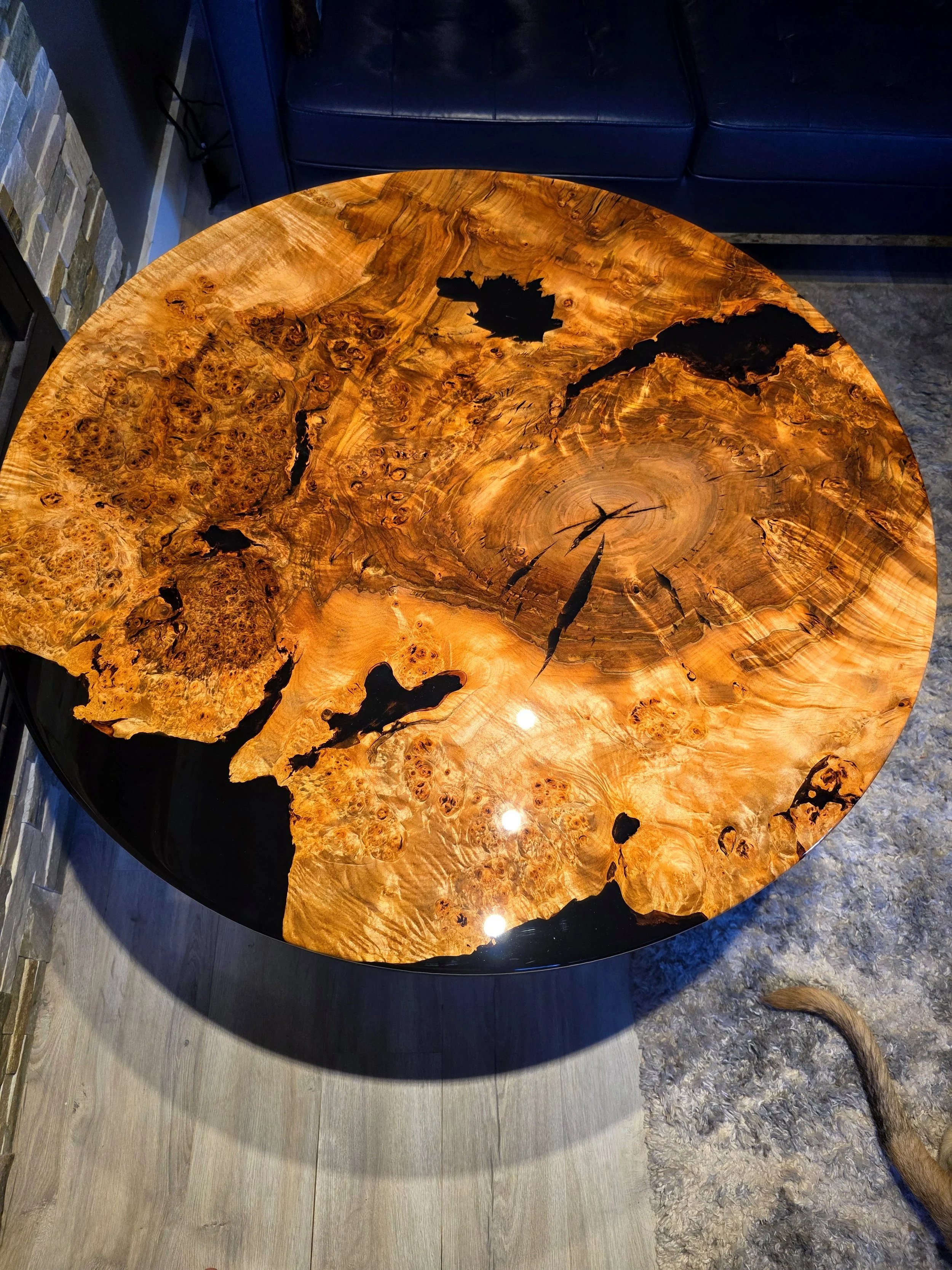 Live edge table made from figured maple burl and black epoxy resin - Black epoxy resin table