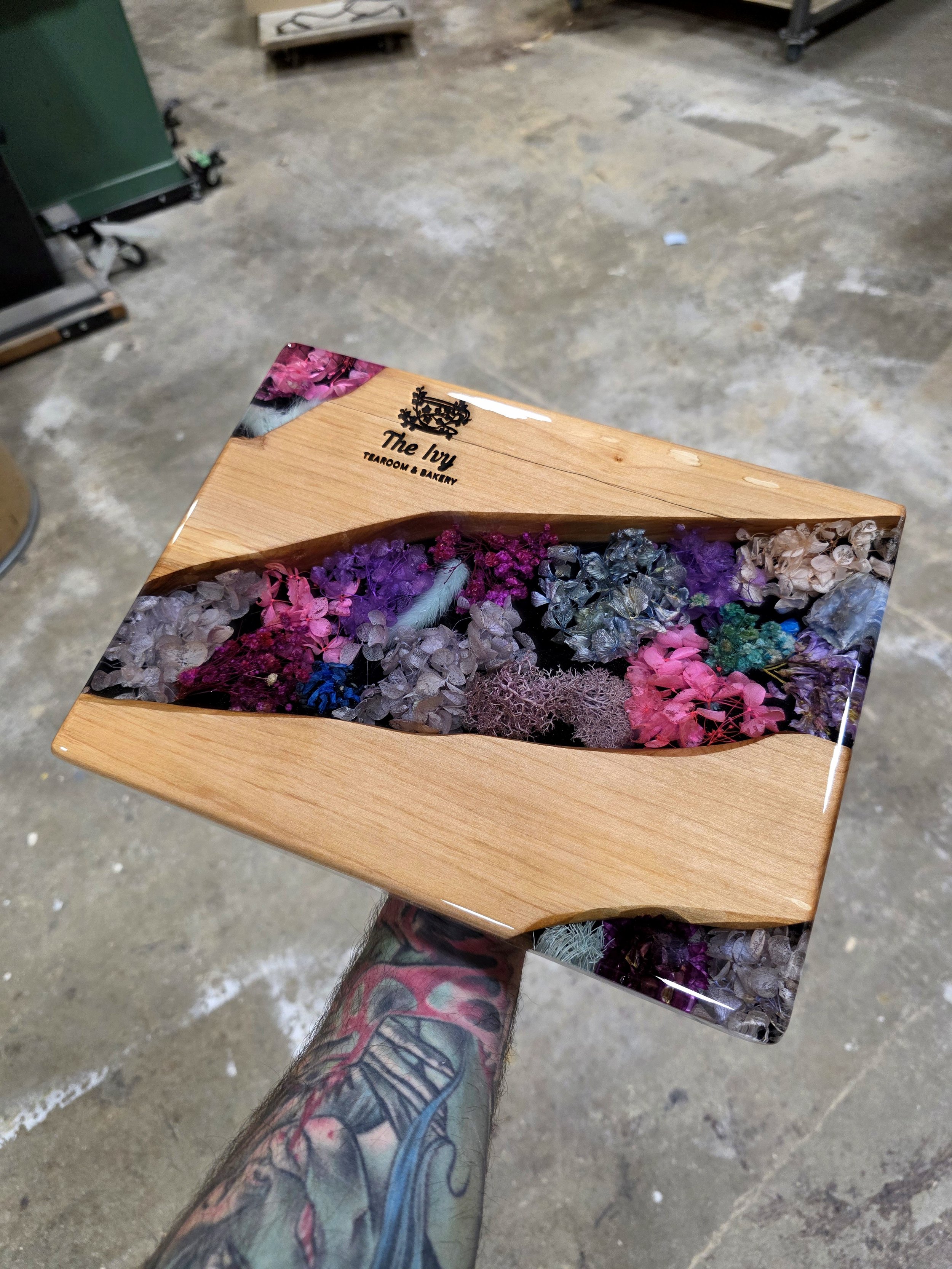 personalized resin charcuterie board with preserved flowers and maple live edge wood