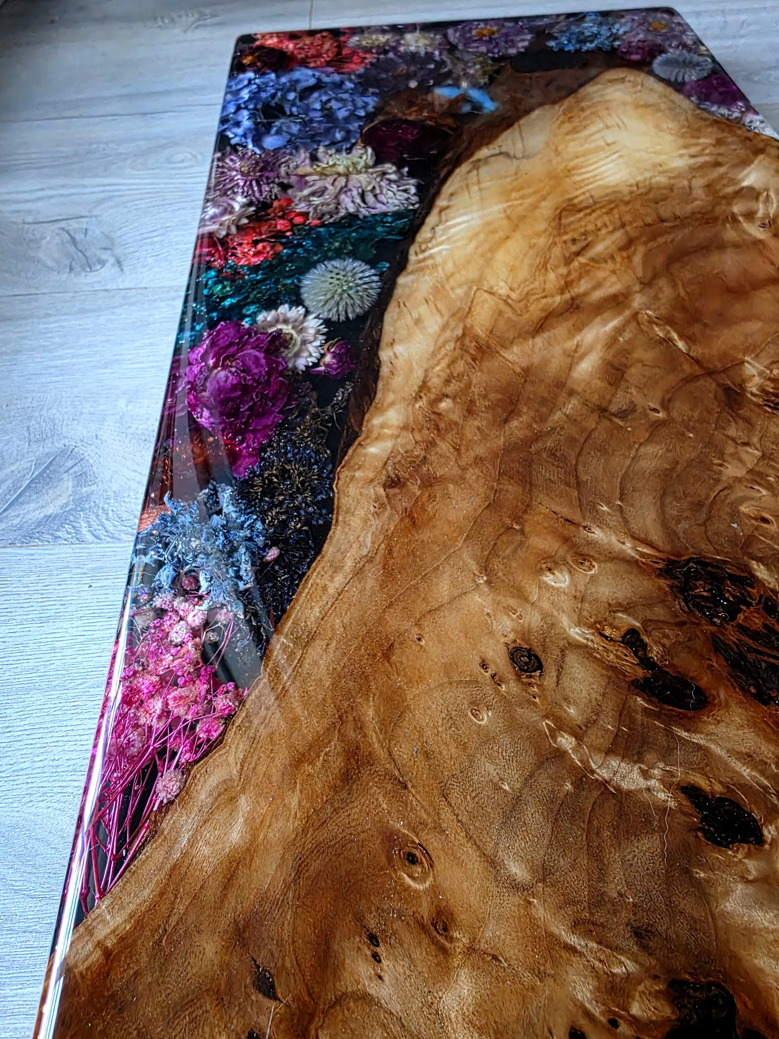 Large 12" x 24" charcuterie board made with beautiful dried flowers, live edge wood and epoxy resin