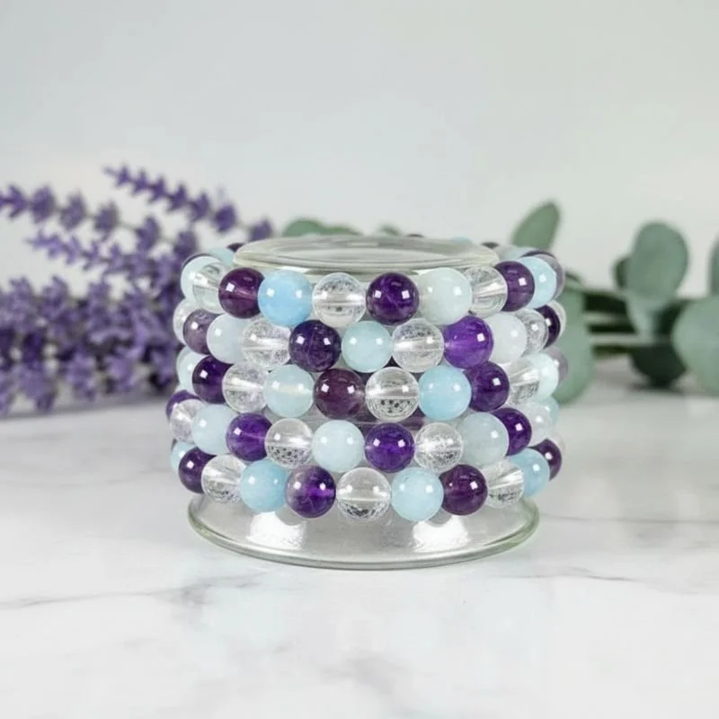 Tranquil Spirit Intention Bracelet with Amethyst, Aquamarine, and Clear Quartz for peace, clarity, and serenity.