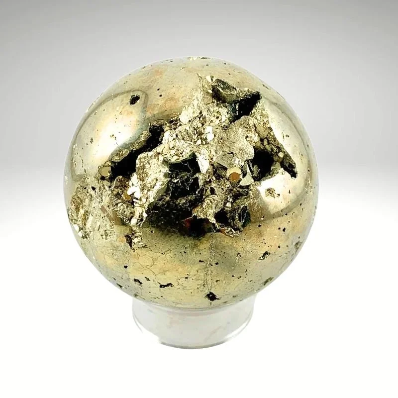 60mm Pyrite sphere with bright metallic luster and natural druzy pockets at Infinity Crystal Shop.