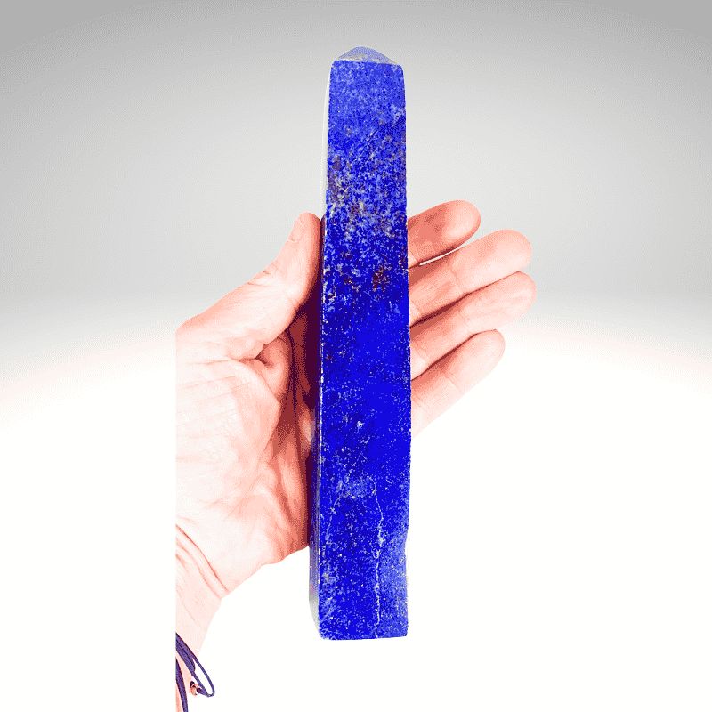 Lapis Lazuli tower with deep blue color and golden pyrite flecks at Infinity Crystal Shop.