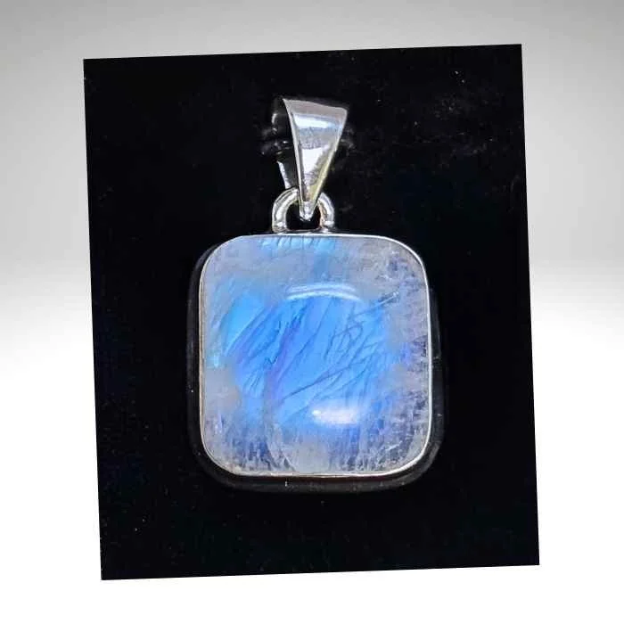 Rainbow Moonstone sterling silver pendant with bright blue flash at Infinity Crystal Shop.