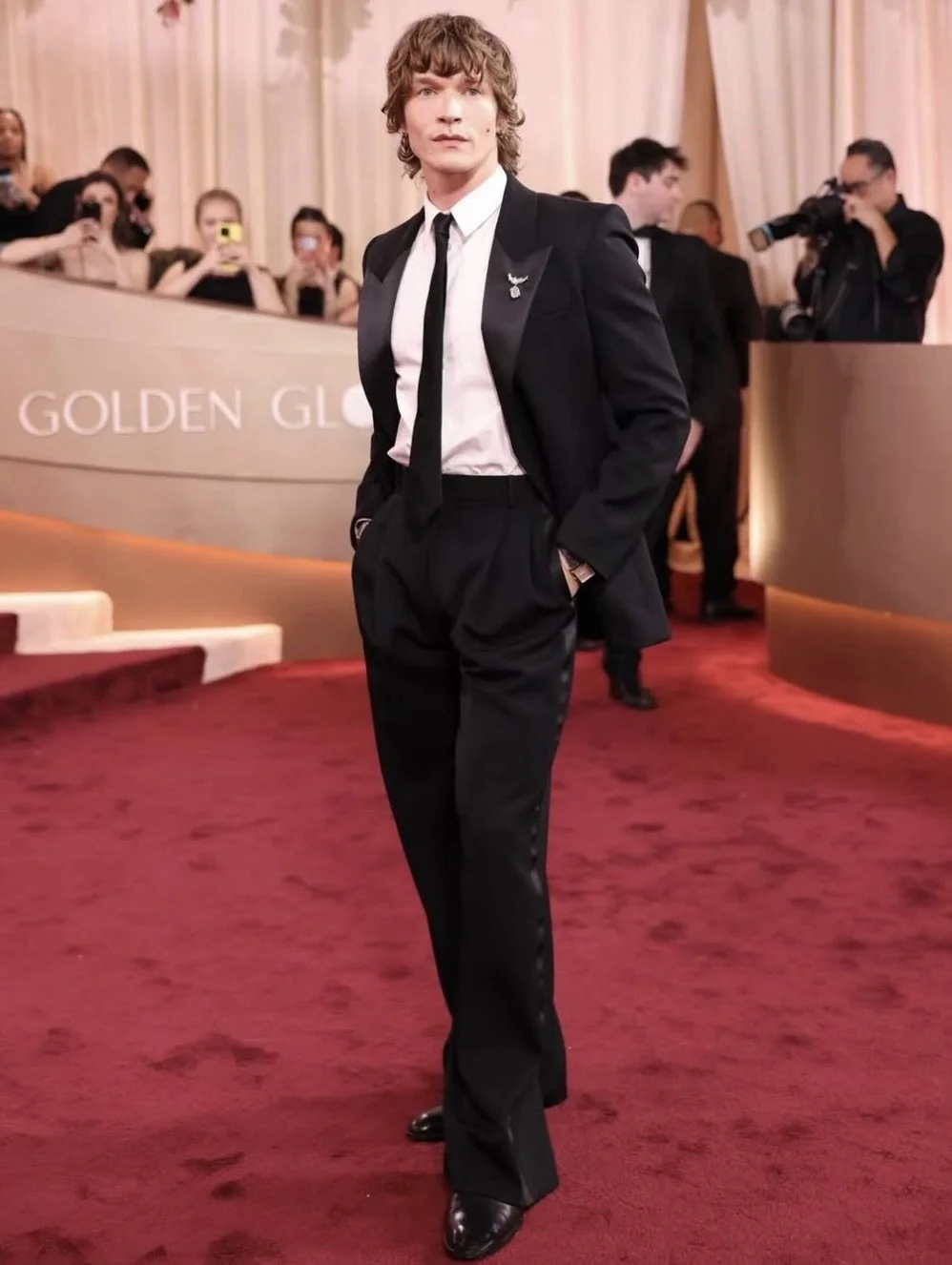 Connor Storrie wears Saint Laurent for the 2026 Golden Globes; Assisting for James Yardley