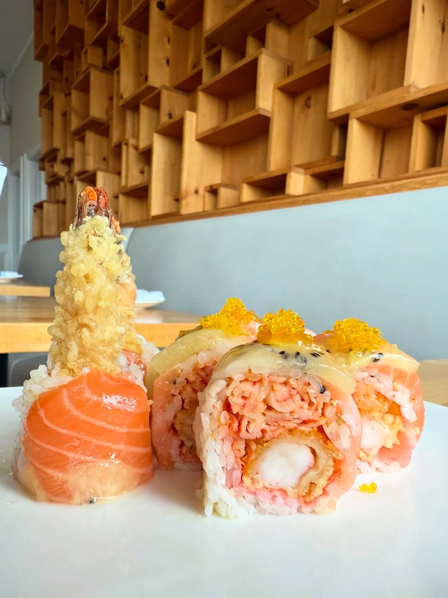 Sunrise Roll - Shrimp tempura, spicy crab, salmon, golden kiwi &amp; yuzu