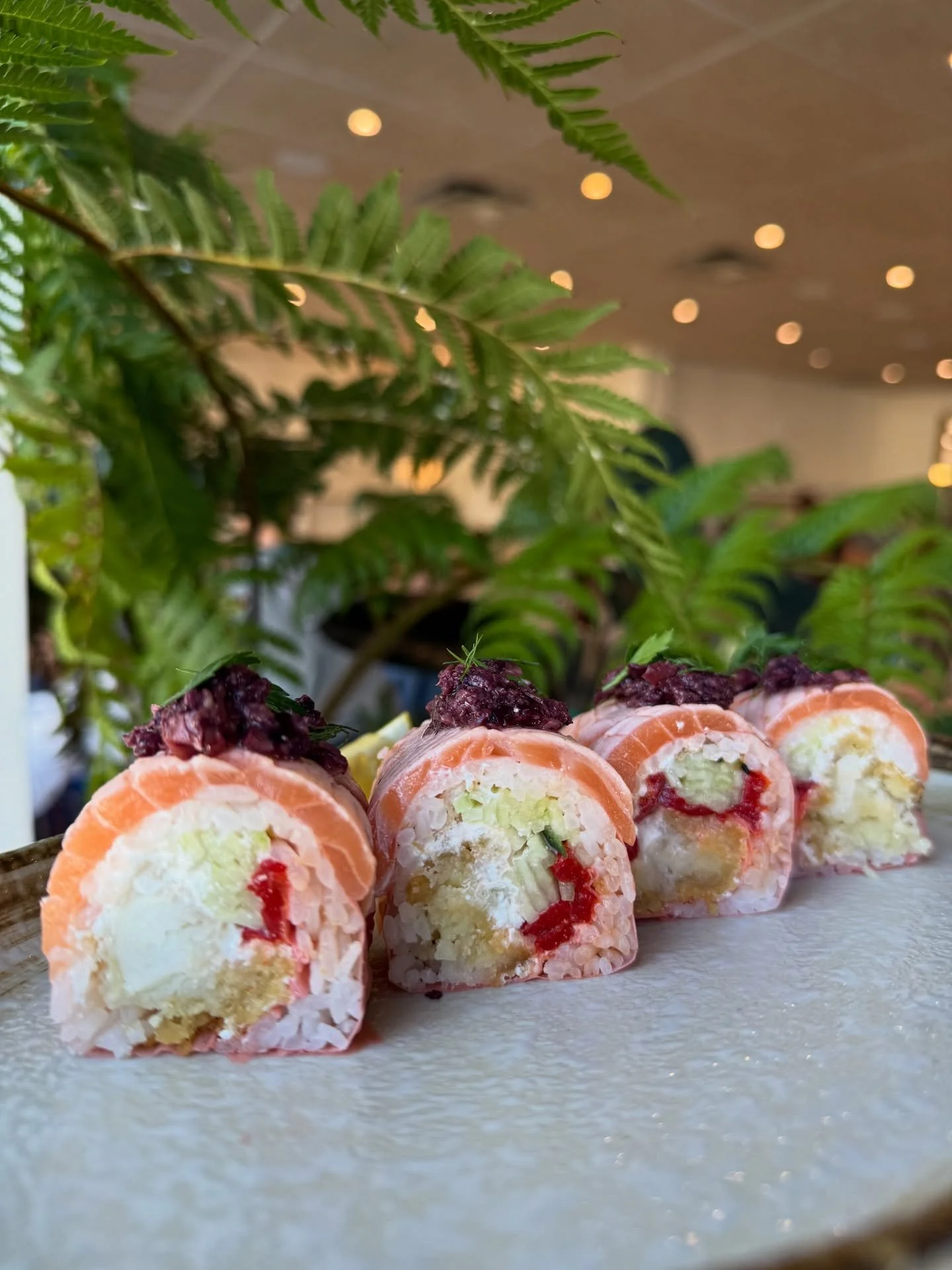 Dionysus Roll - whipped feta, roasted pepper, cucumber, panko crusted seabass; light seared salmon and olive tapenade