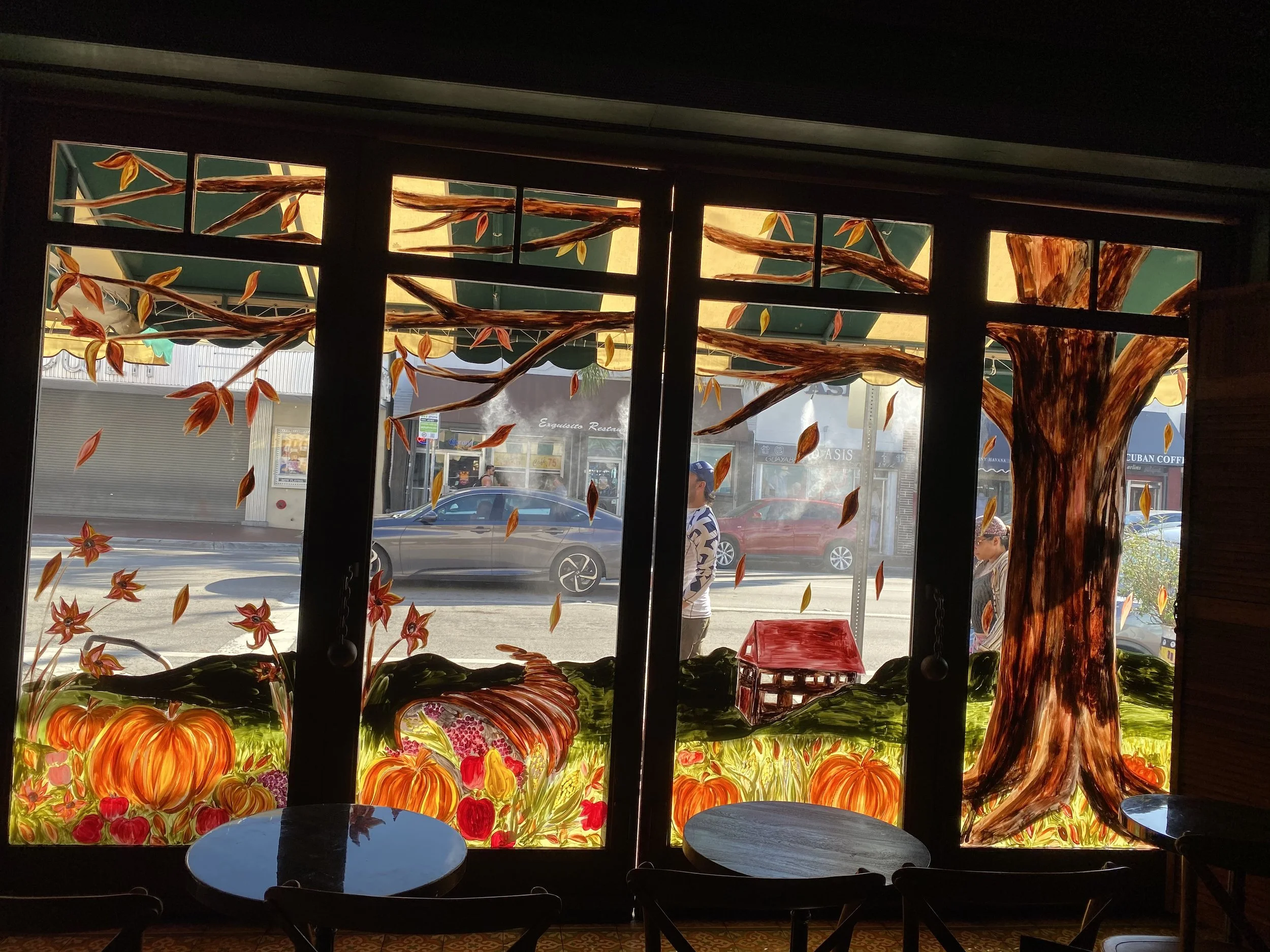Seasonal window murals at Ball and Chain, Miami, FL