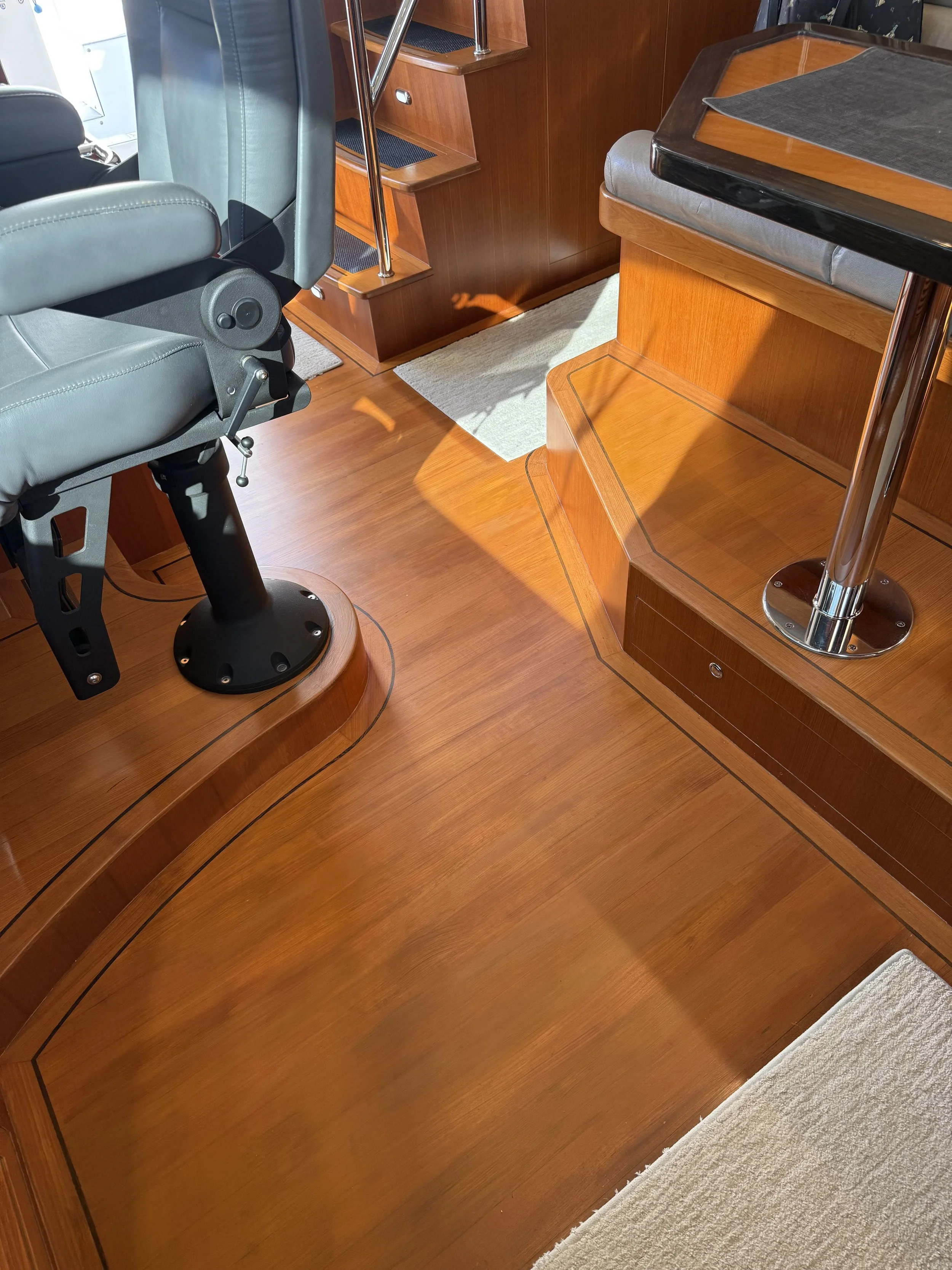 Wood on yacht restoration. I painted the floor to match the real wood around it. It had 100's of hole in it that I filled, painted, and re-sealed.