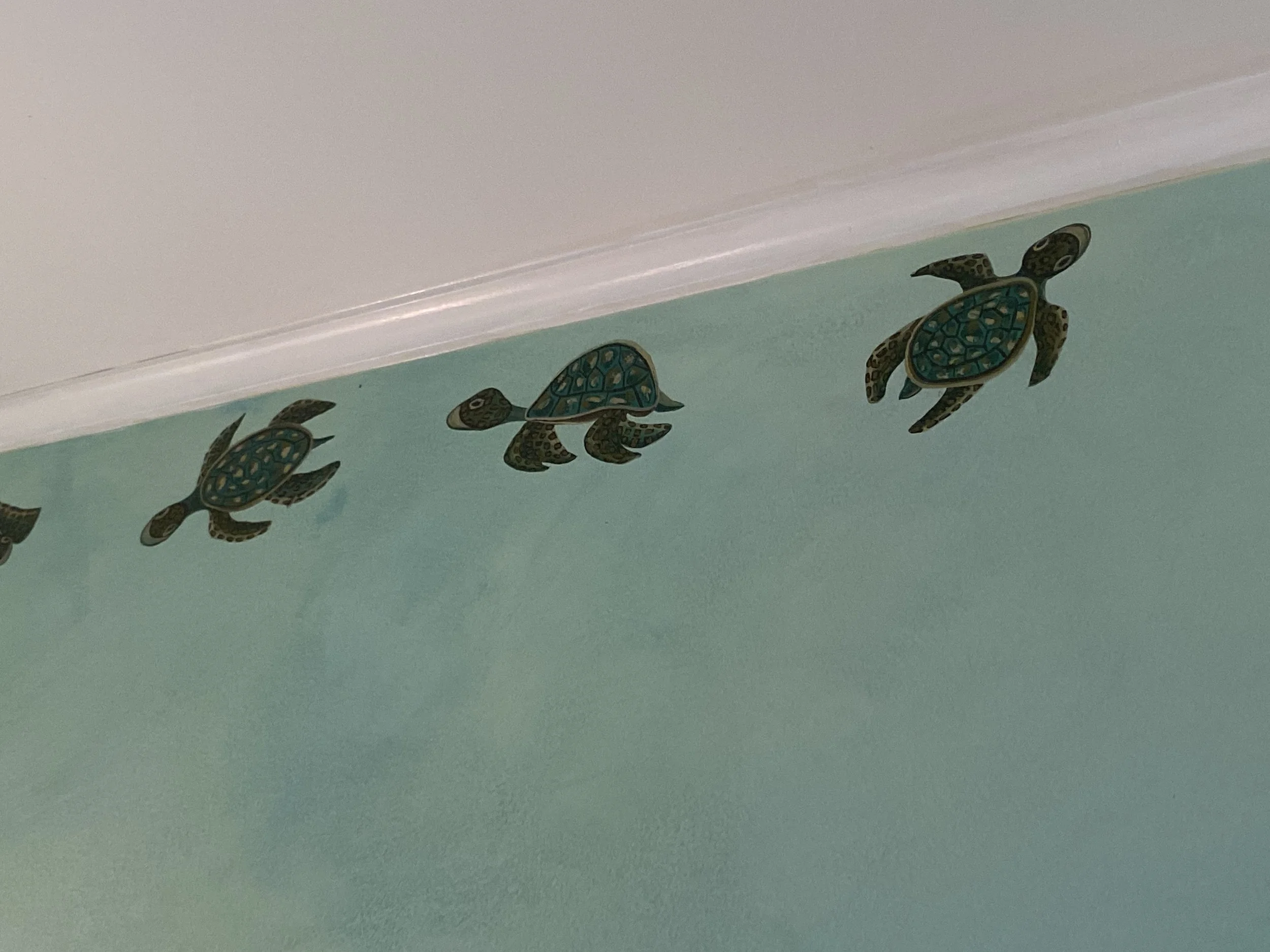 Bathroom mural with turtles 