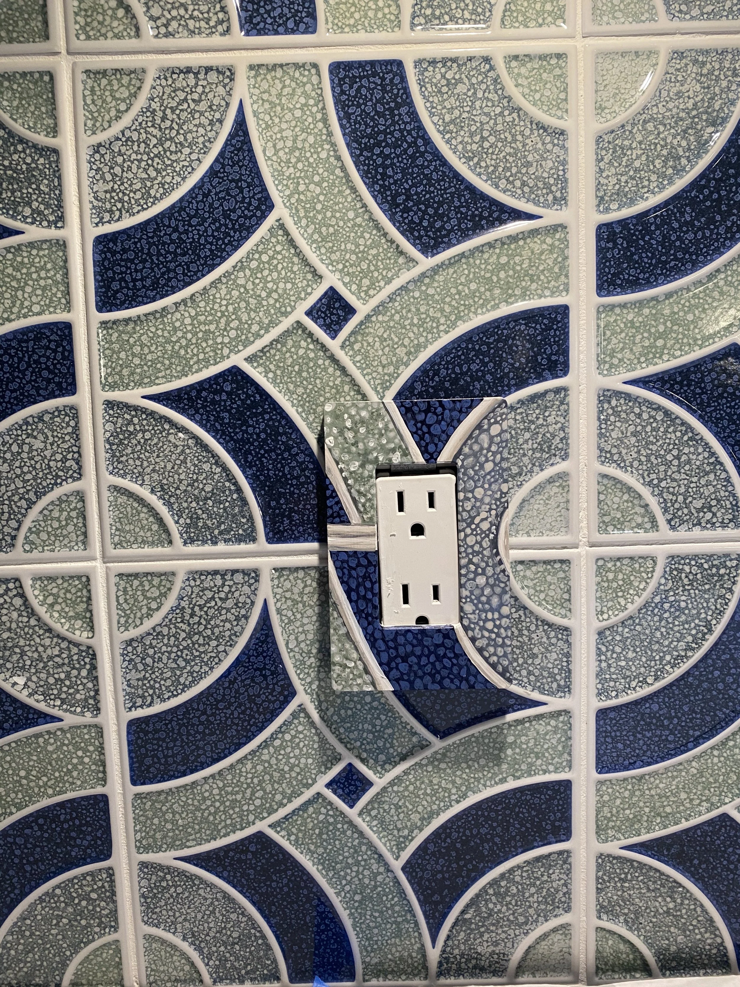 Outlet to match wallpaper