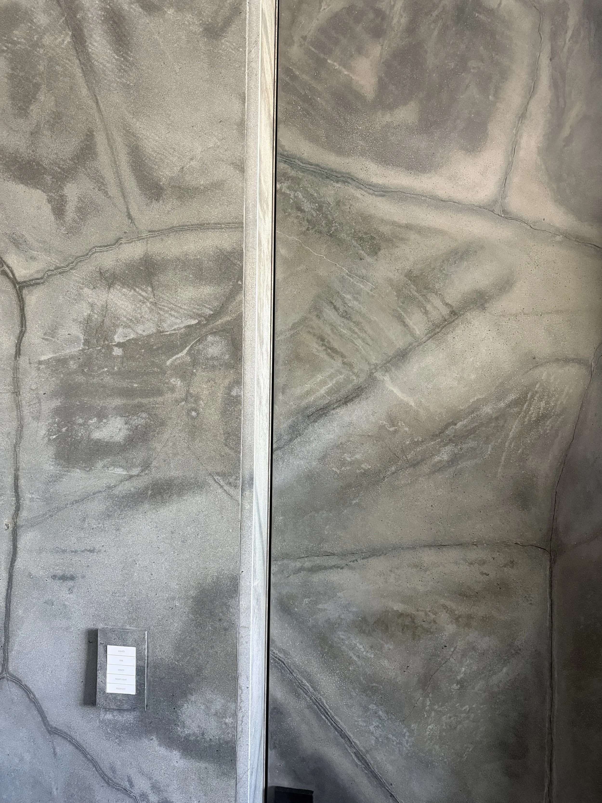 Faux granite door to match the real granite surrounding it