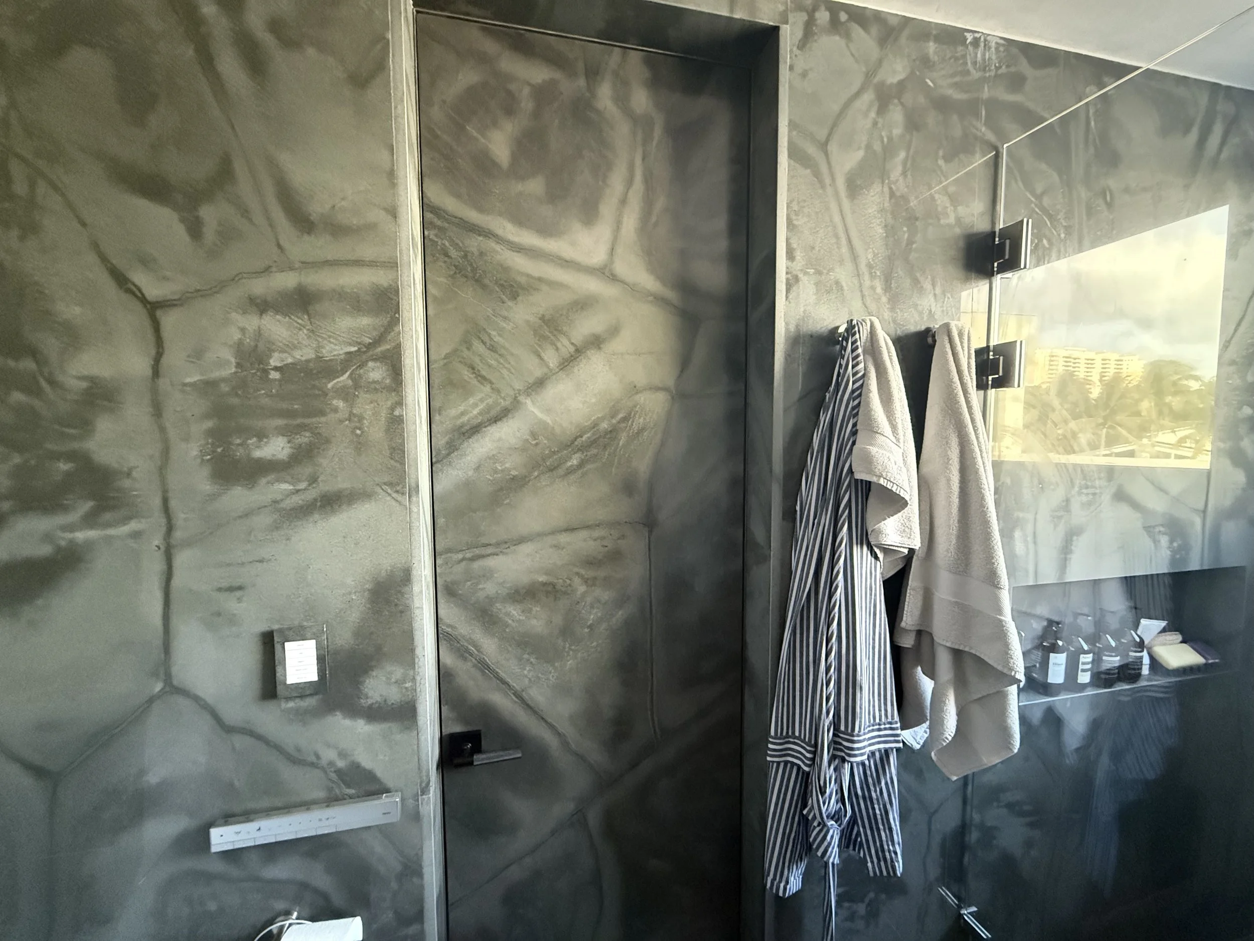 Faux granite door to match the real granite surrounding it