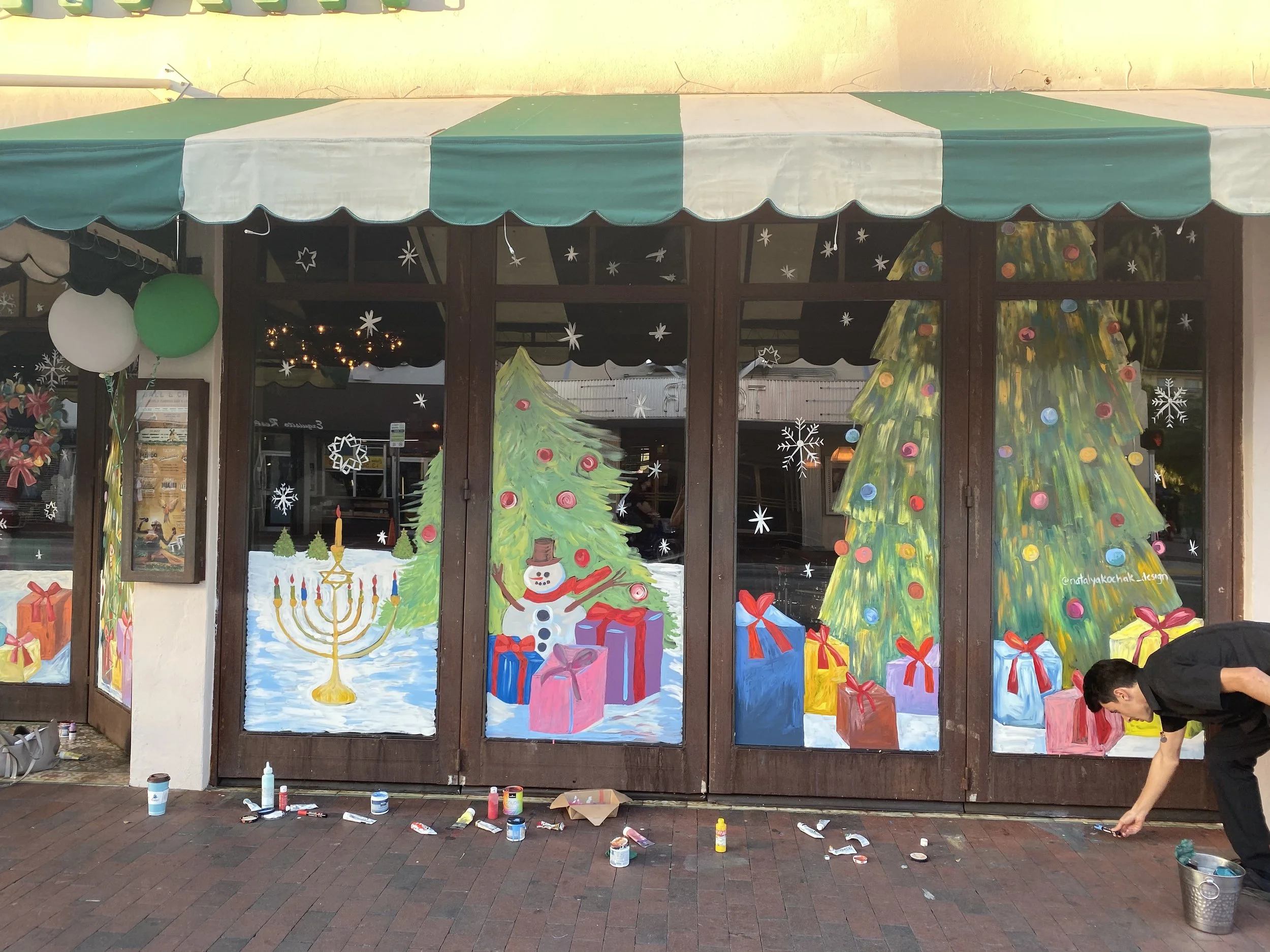 Seasonal window murals at Ball and Chain, Miami, FL