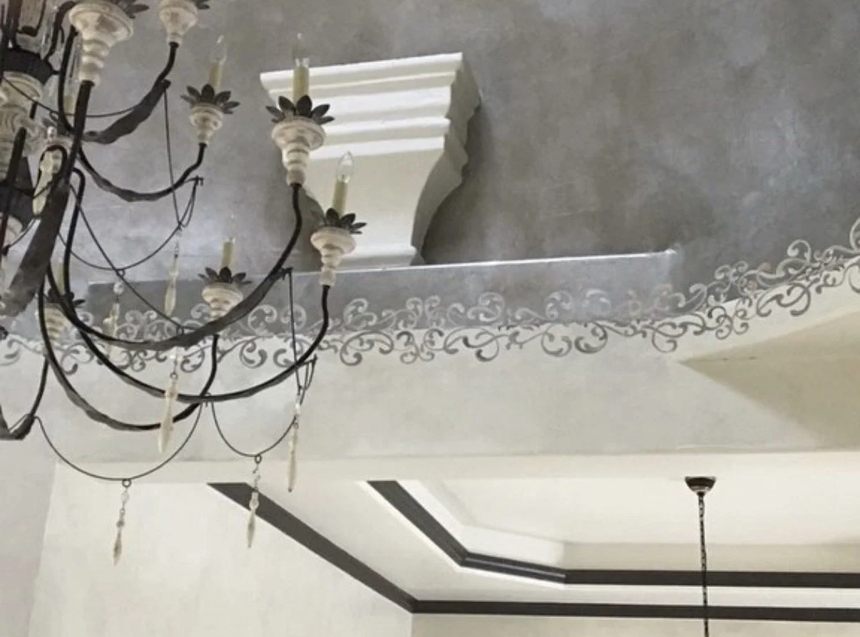 Hand painting connecting dome to wall finishes