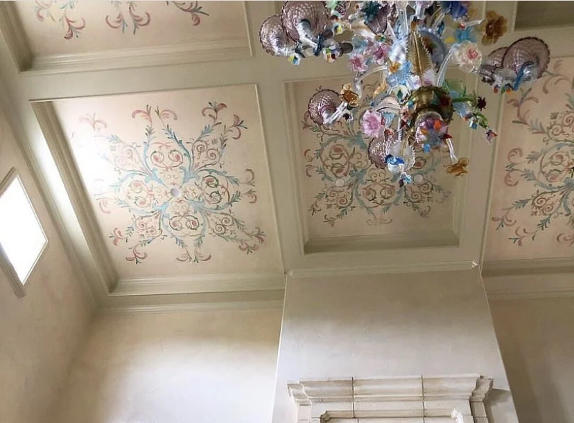 Pink metallic finish throughout house with hand painting on top to match the chandelier
