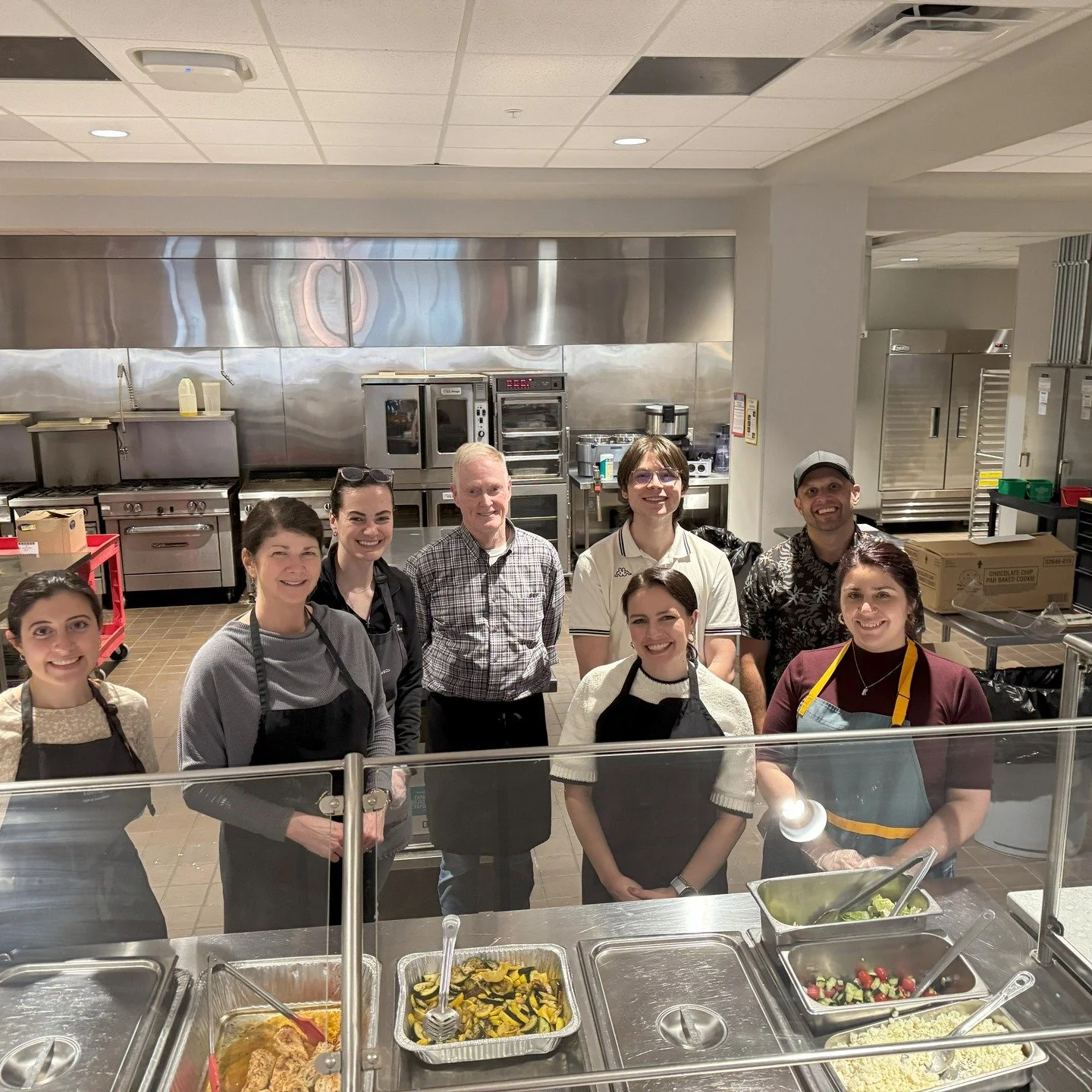 Last week, our team was excited to volunteer at the Ronald McDonald House through their Team Cuisine Program. We sponsored, prepared, and served meals for approximately 50 families. 
But don't let this fool you - we made some time to clown around in