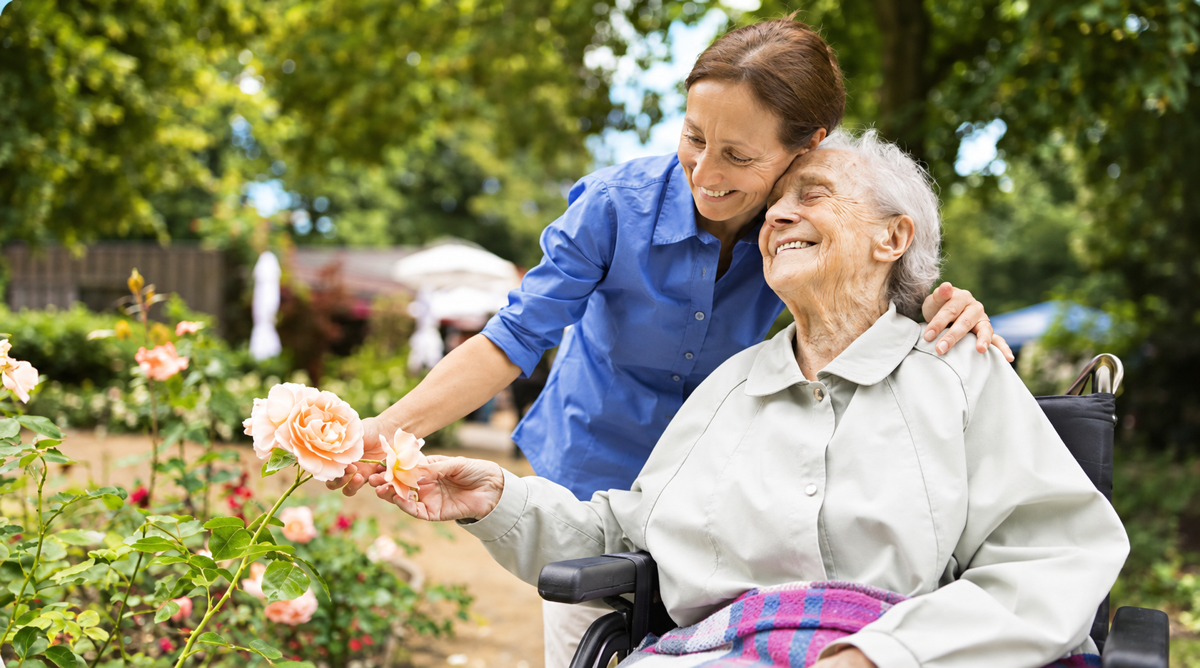 Two women in a rose garden.png
