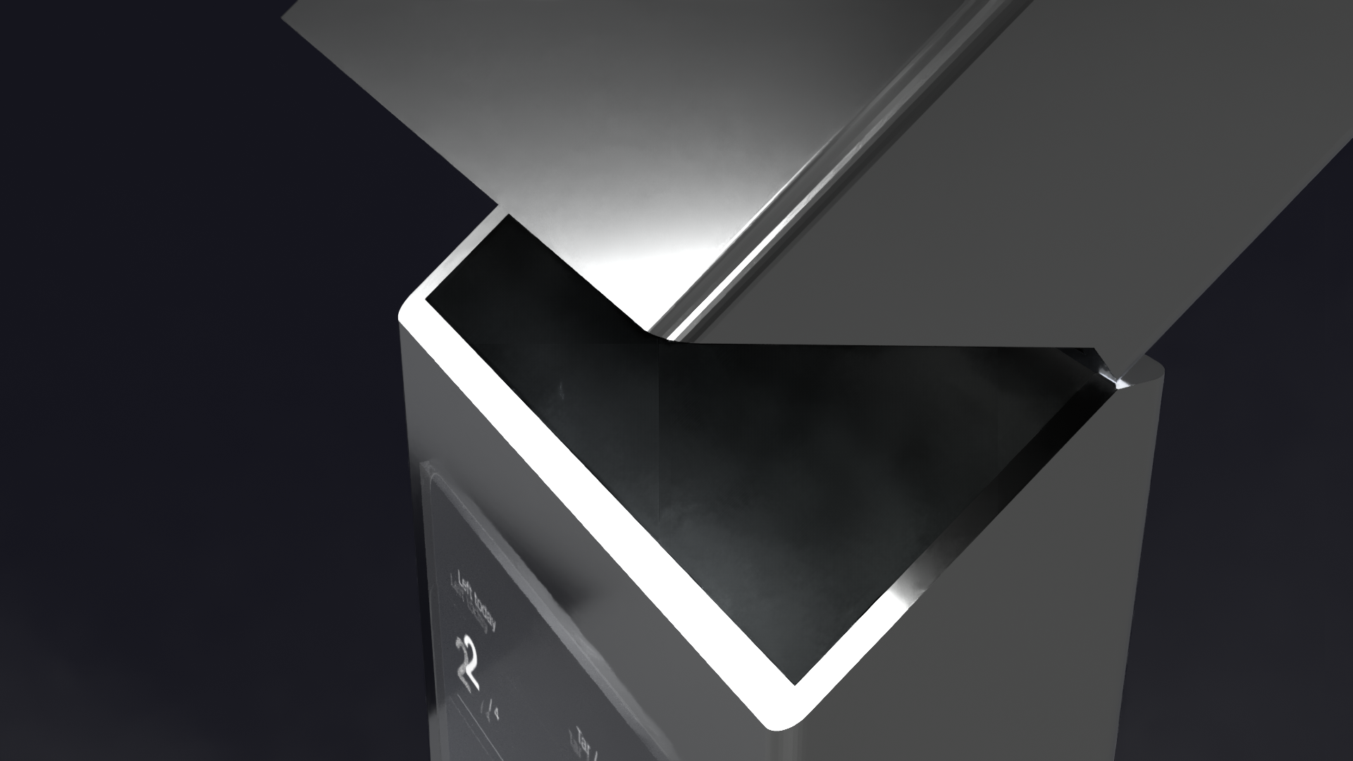 Close-up of a modern trash can with a sleek, black exterior and a silver lid in an indoor setting.