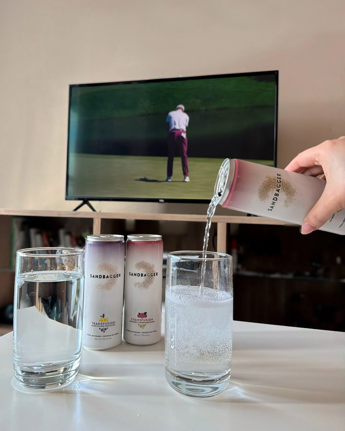 Clubhouse vibes, couch location.

Line up Transfusion and Cransfusion, call a few friends, and make this weekend feel like your own private 19th hole.
